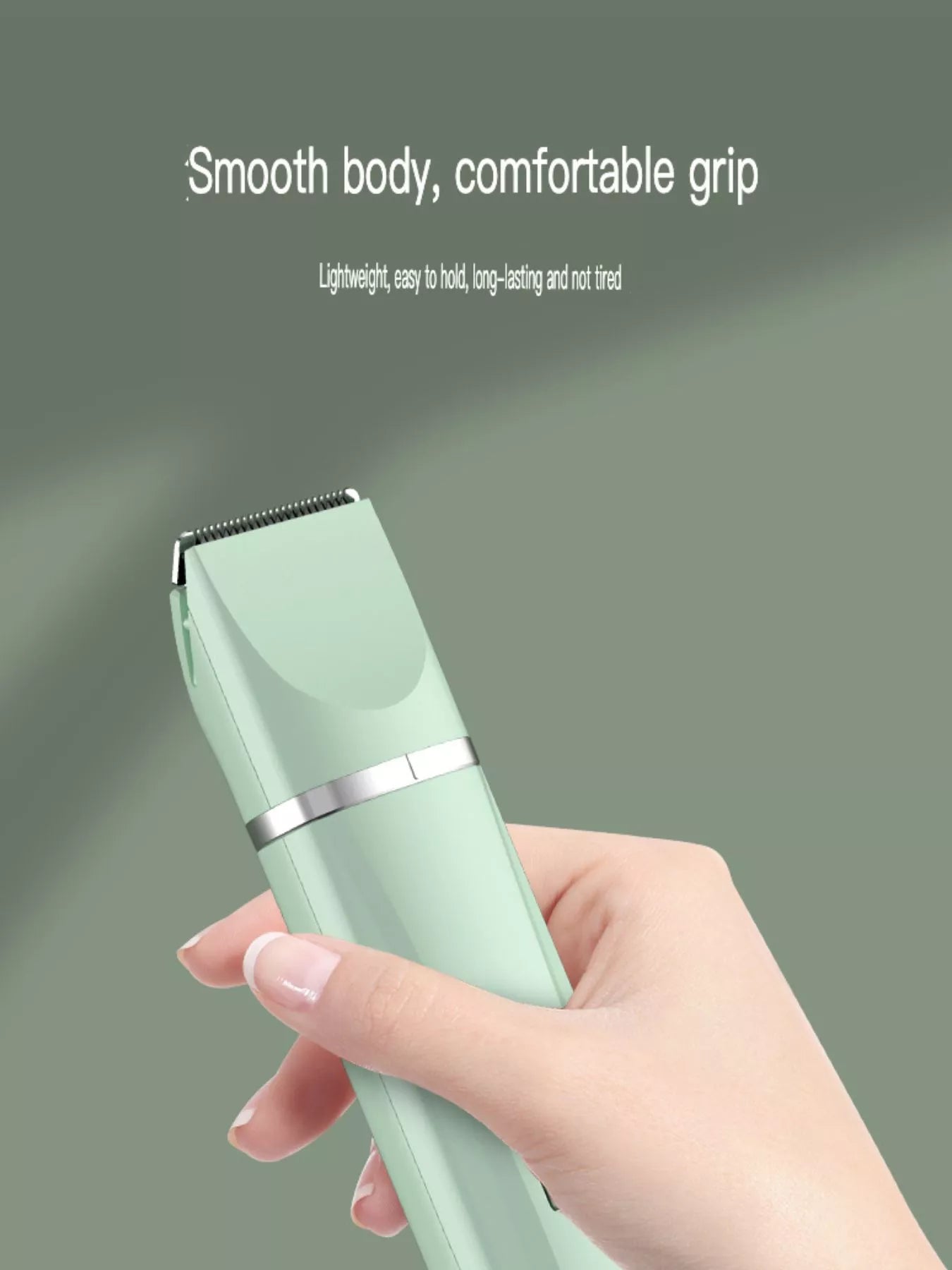 Pet grooming clipper with smooth body and comfortable grip, shown in hand