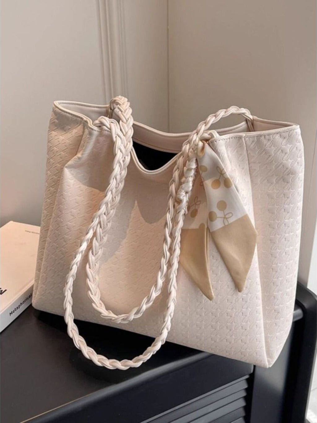 Ivory braided handle tote bag, open top with ribbon bow at the handle