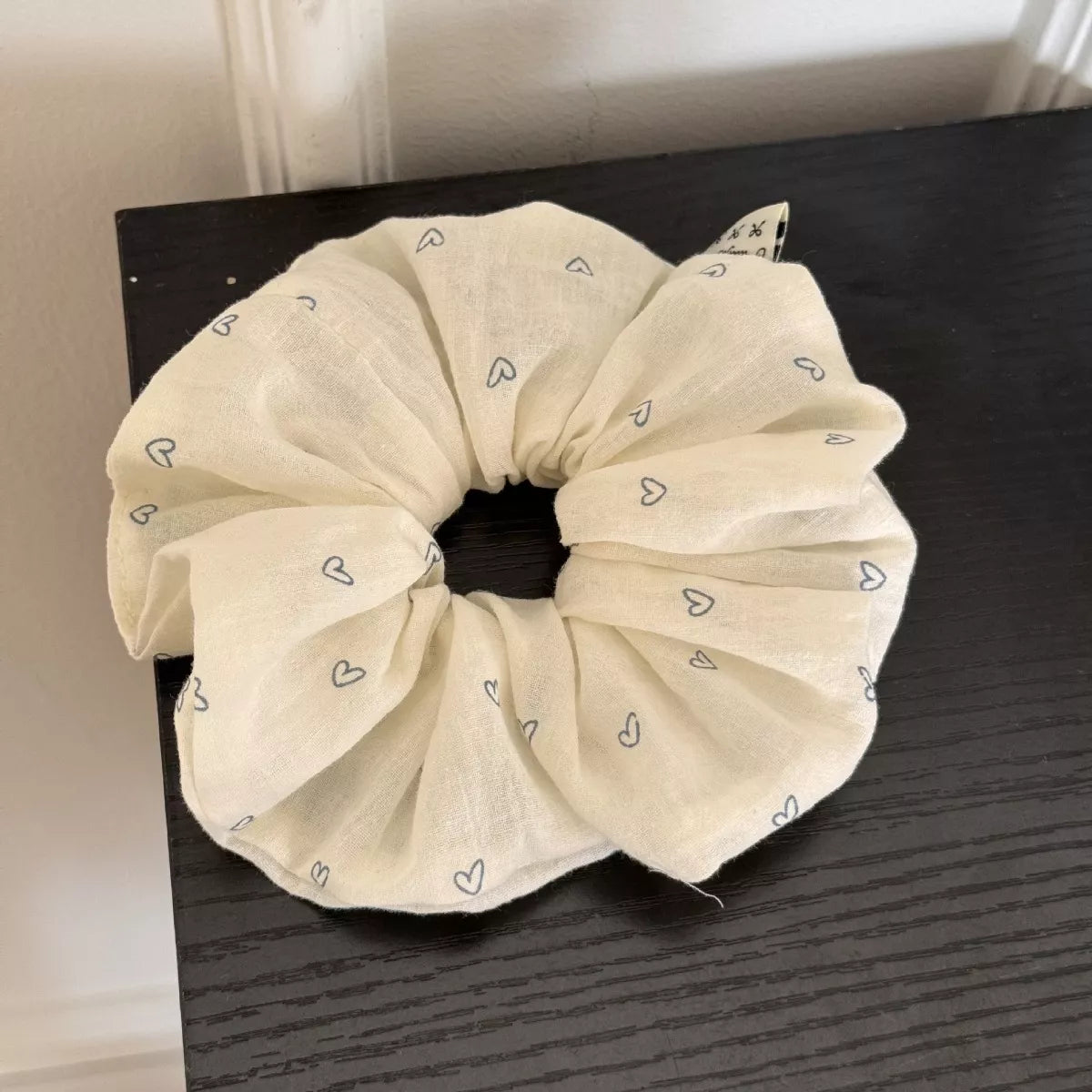 Ivory hair scrunchie with small heart pattern