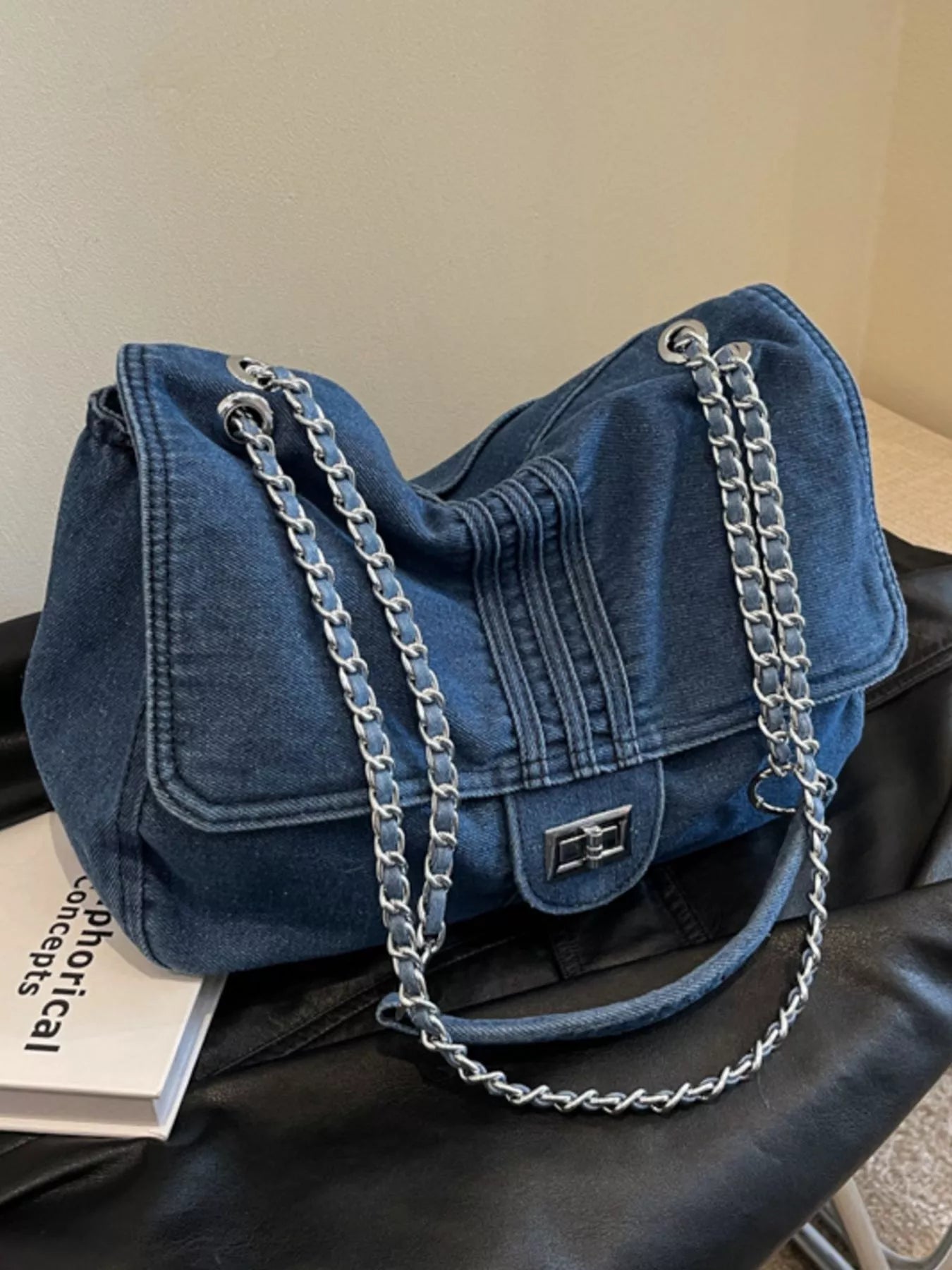 Blue denim flap chain shoulder bag with front clasp and silver double-chain strap