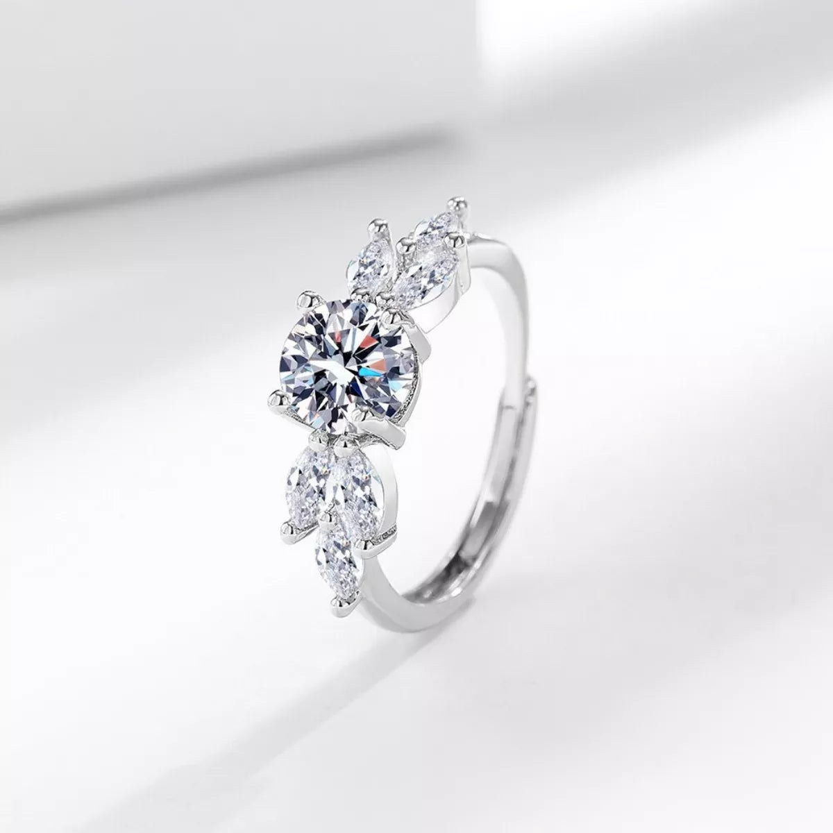 1-carat moissanite ring in 925 sterling silver, marquise and pear stones on split band