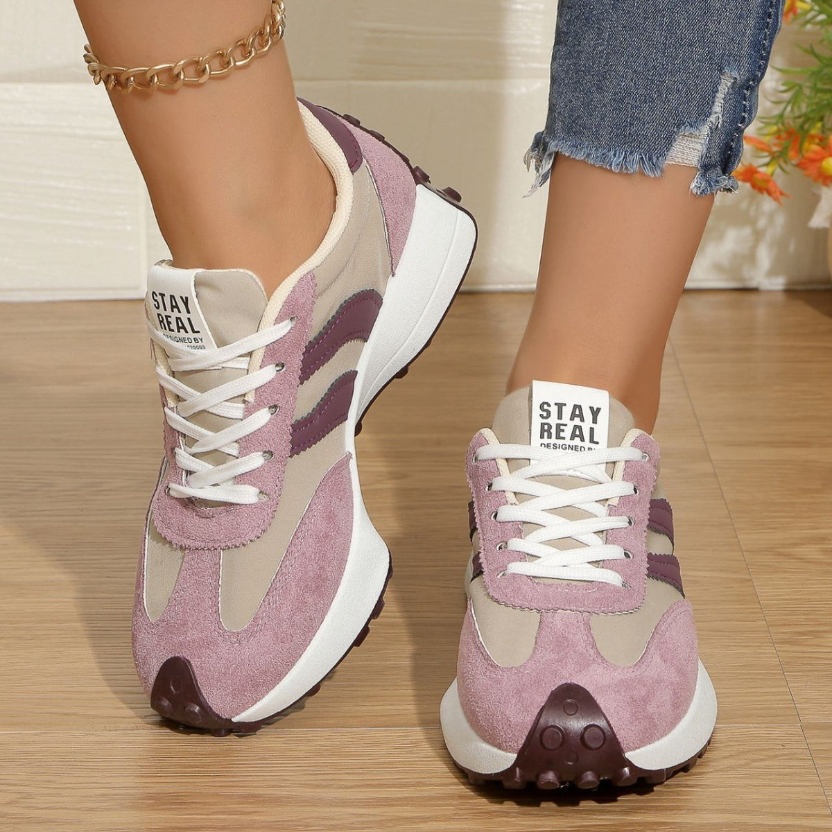 Round toe lace-up sneakers, pink/purple upper with white laces and rear logo