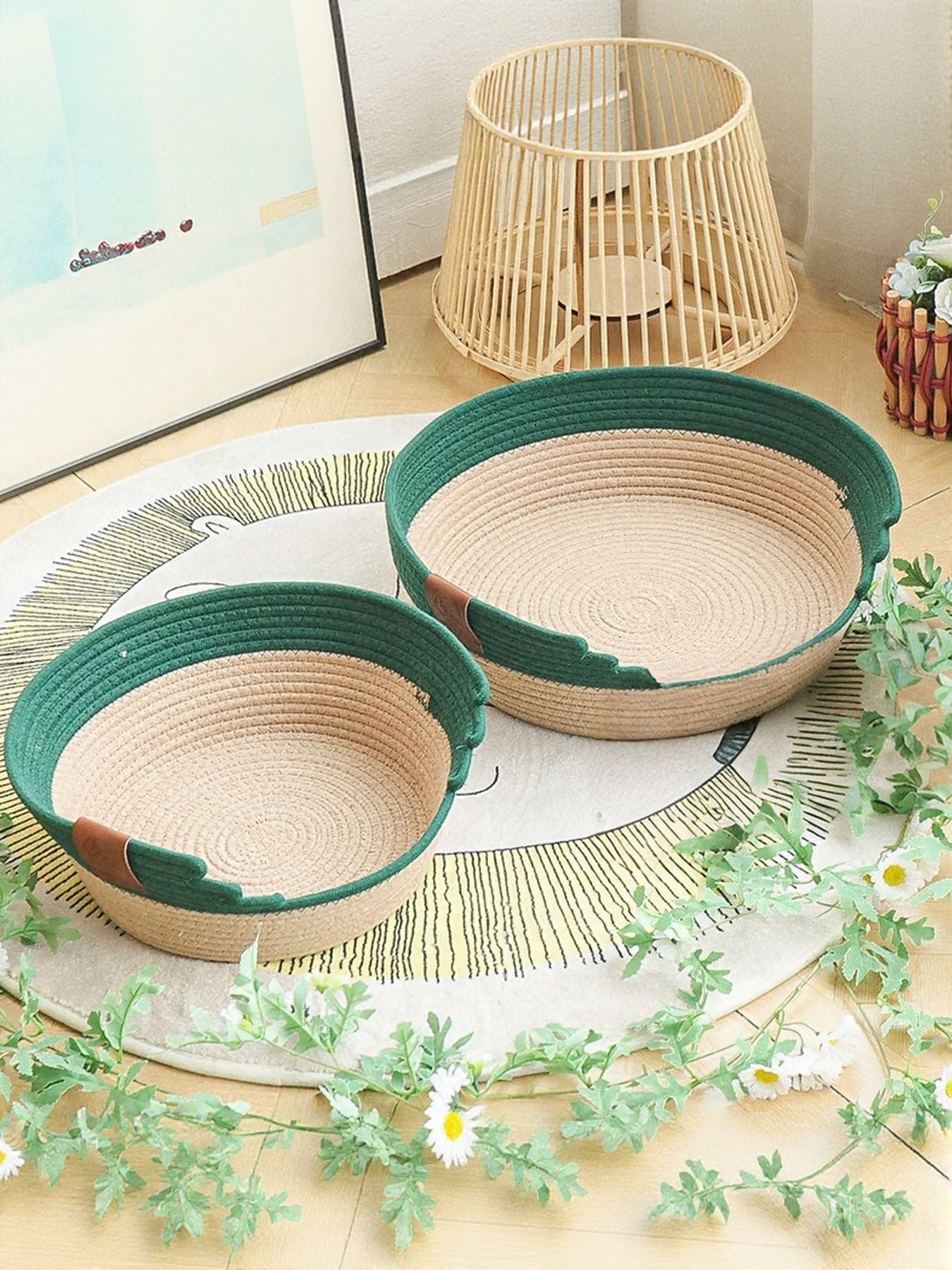 Woven Pet Nest set of two oval woven baskets with green edging and beige interiors