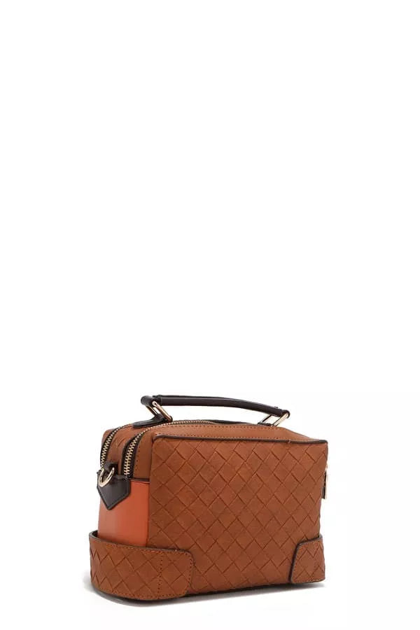 Brown quilted mini satchel with side pocket tabs and top handle
