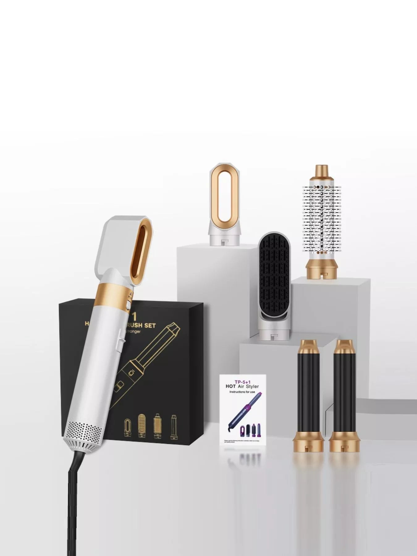 5-in-1 interchangeable hot air brush set with white handle and multiple styling attachments