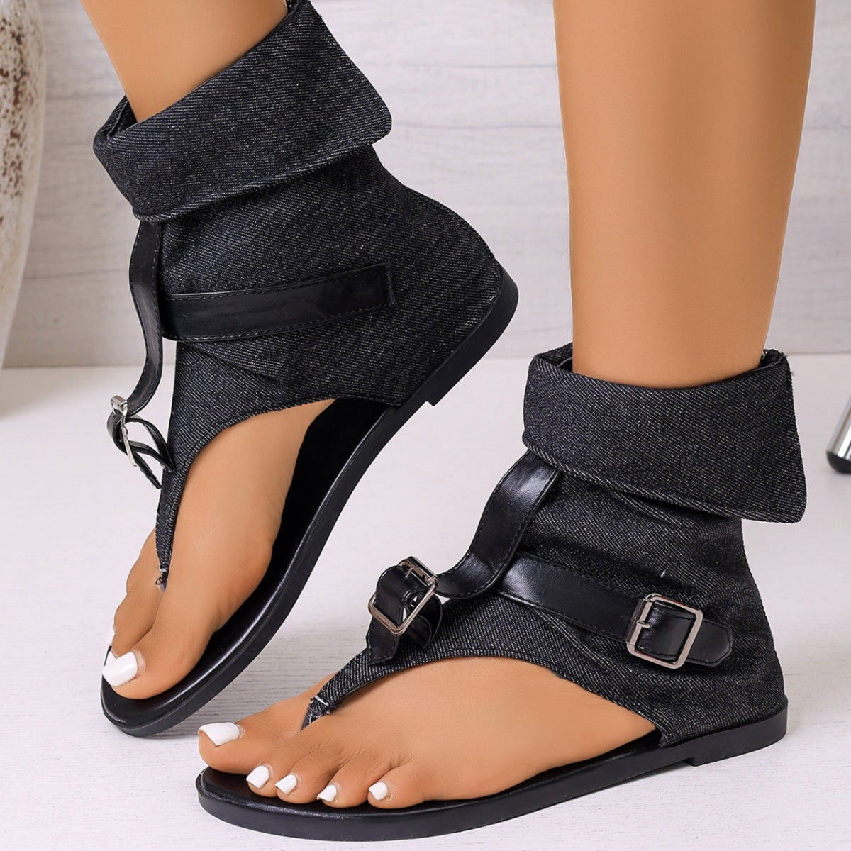 Black denim toe-post sandals with ankle and instep buckle straps, open toe