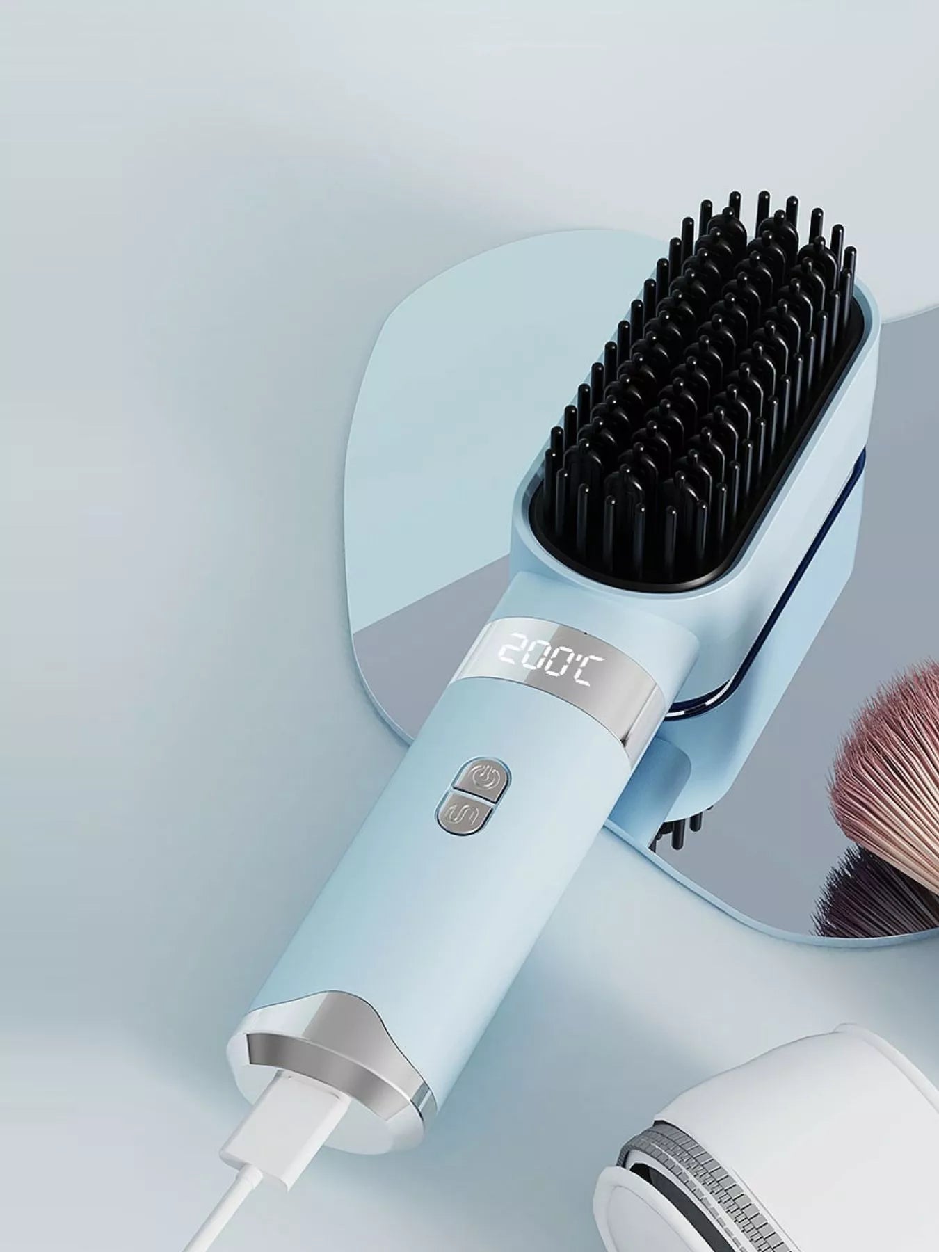 Light blue heated straightening comb with black bristles and LCD 200°C