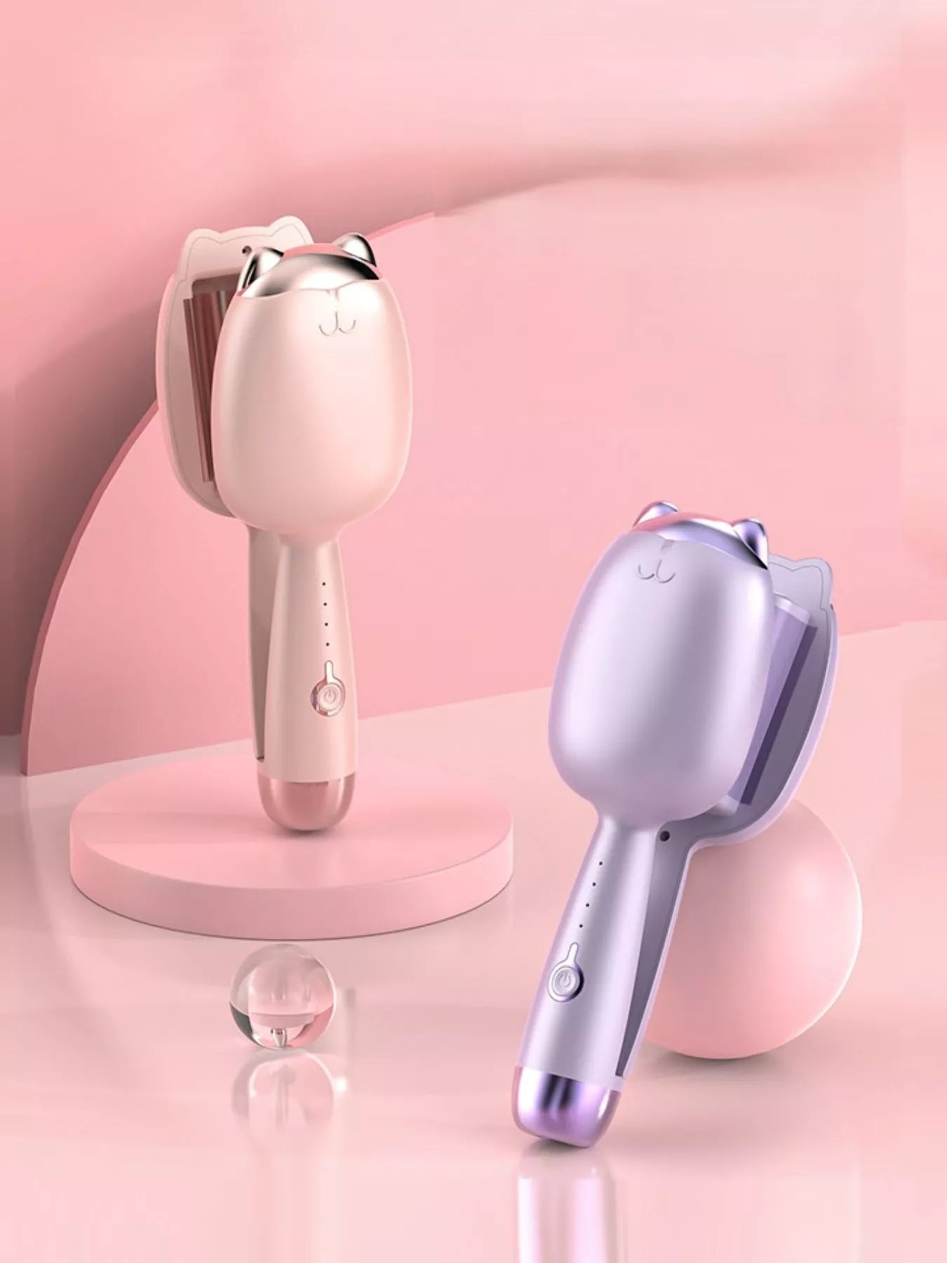 Pale Blush cat-shaped heated curling iron with metallic cat-ear top.