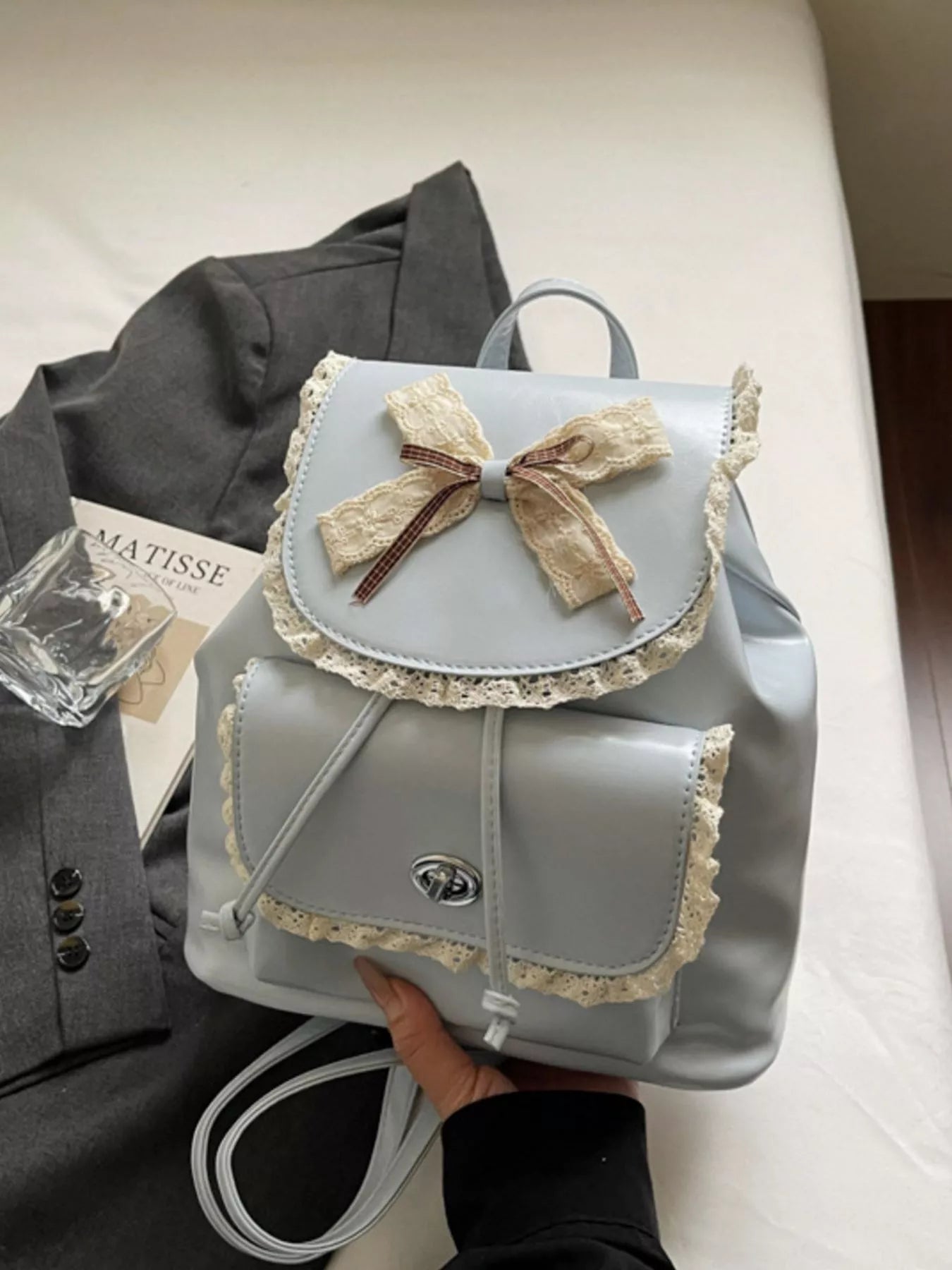Light blue lace bowknot mini backpack with scalloped trim and top handle