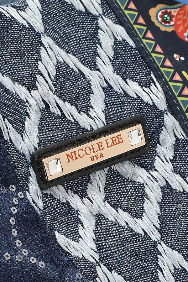Placa “Nicole Lee USA” sobre tejido denim con flecos blancos y bordados Bosque De Amor