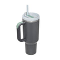 Charcoal 40 oz insulated tumbler with mint handle, clear straw, and lid