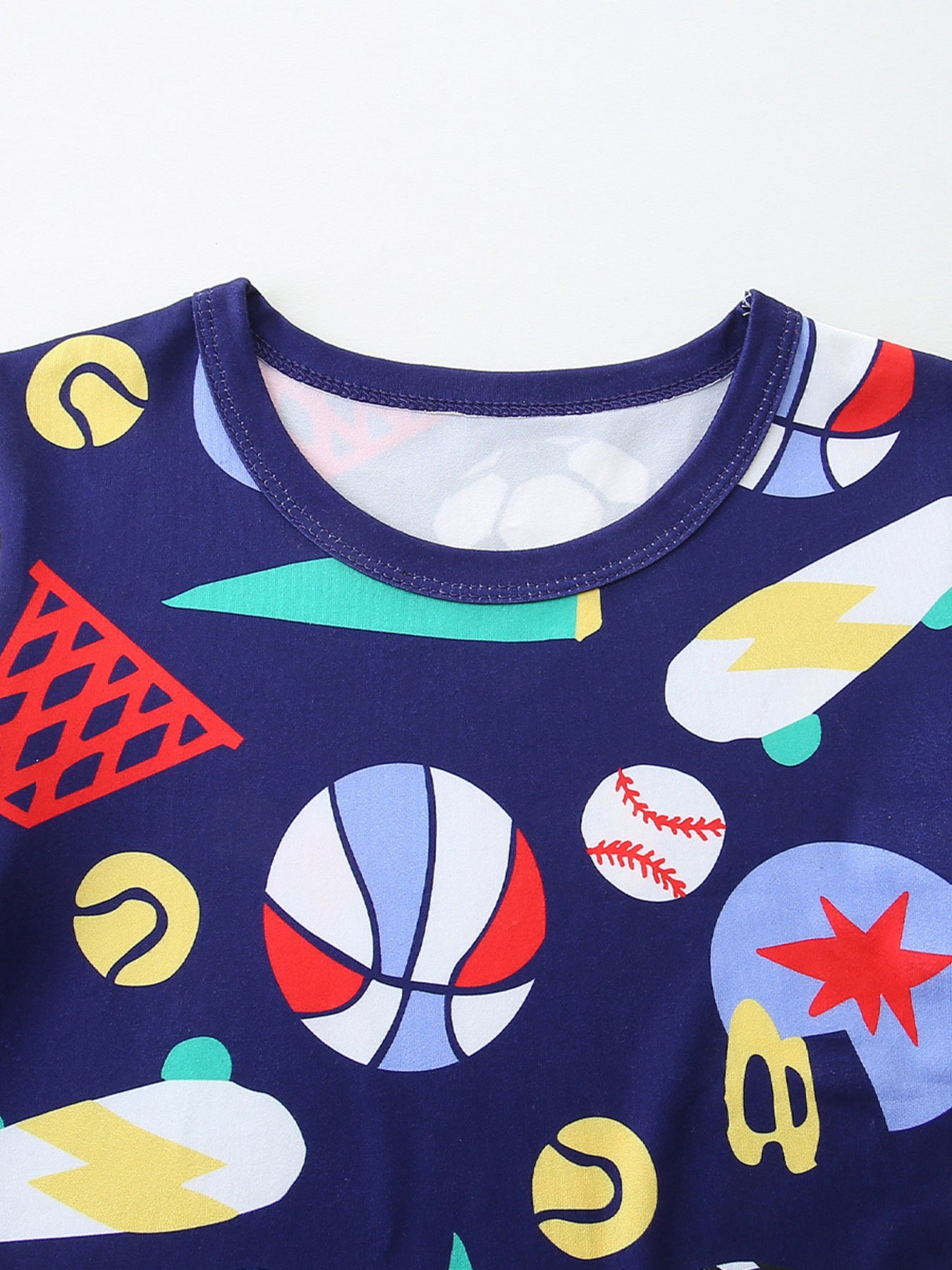 Navy kids round-neck tee with colorful sports icons print