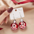 Christmas ball drop earrings in red with silver-tone cap and dangle hook