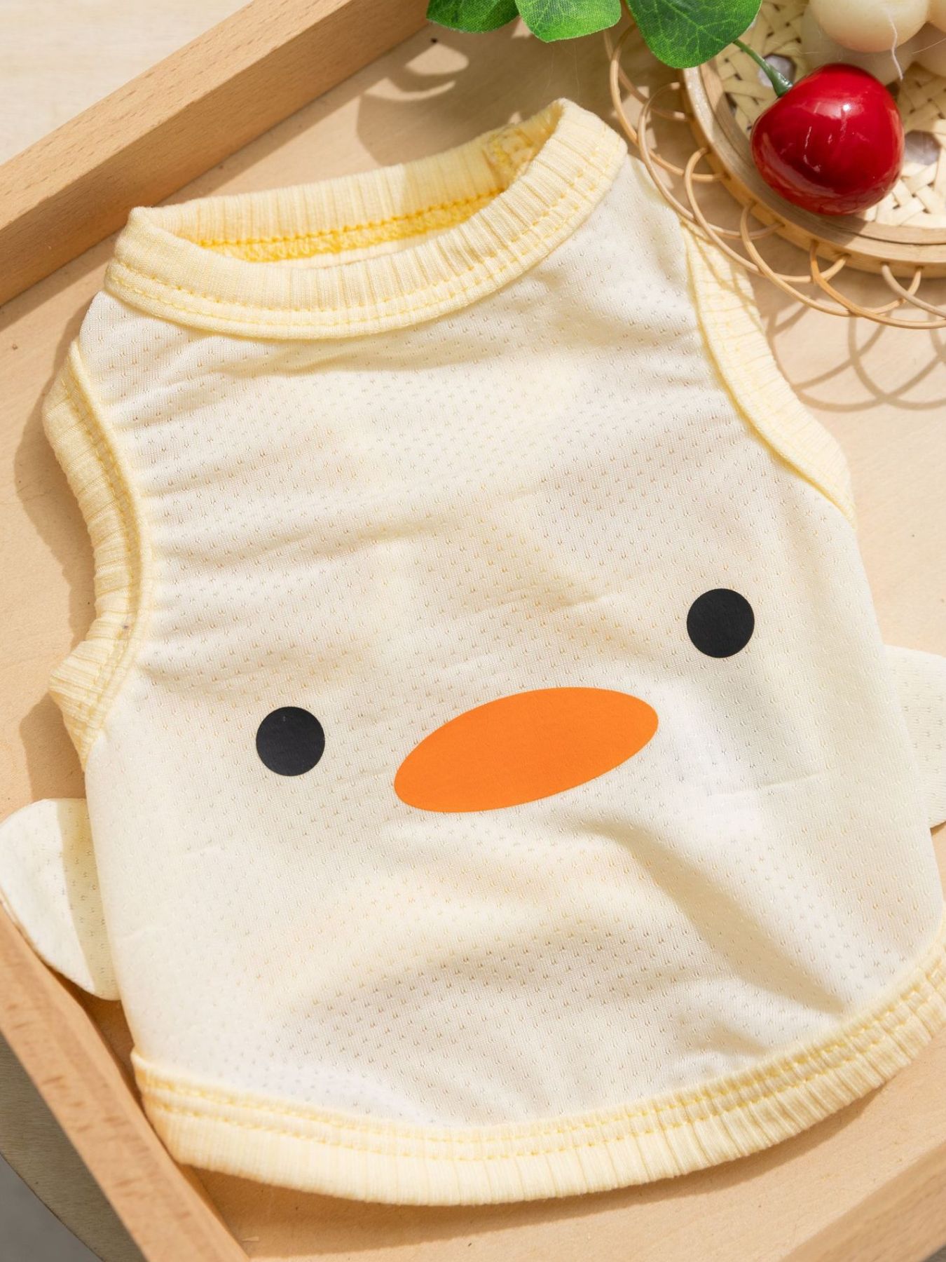 Cream pet tank with orange duck face applique and ribbed neckline trim