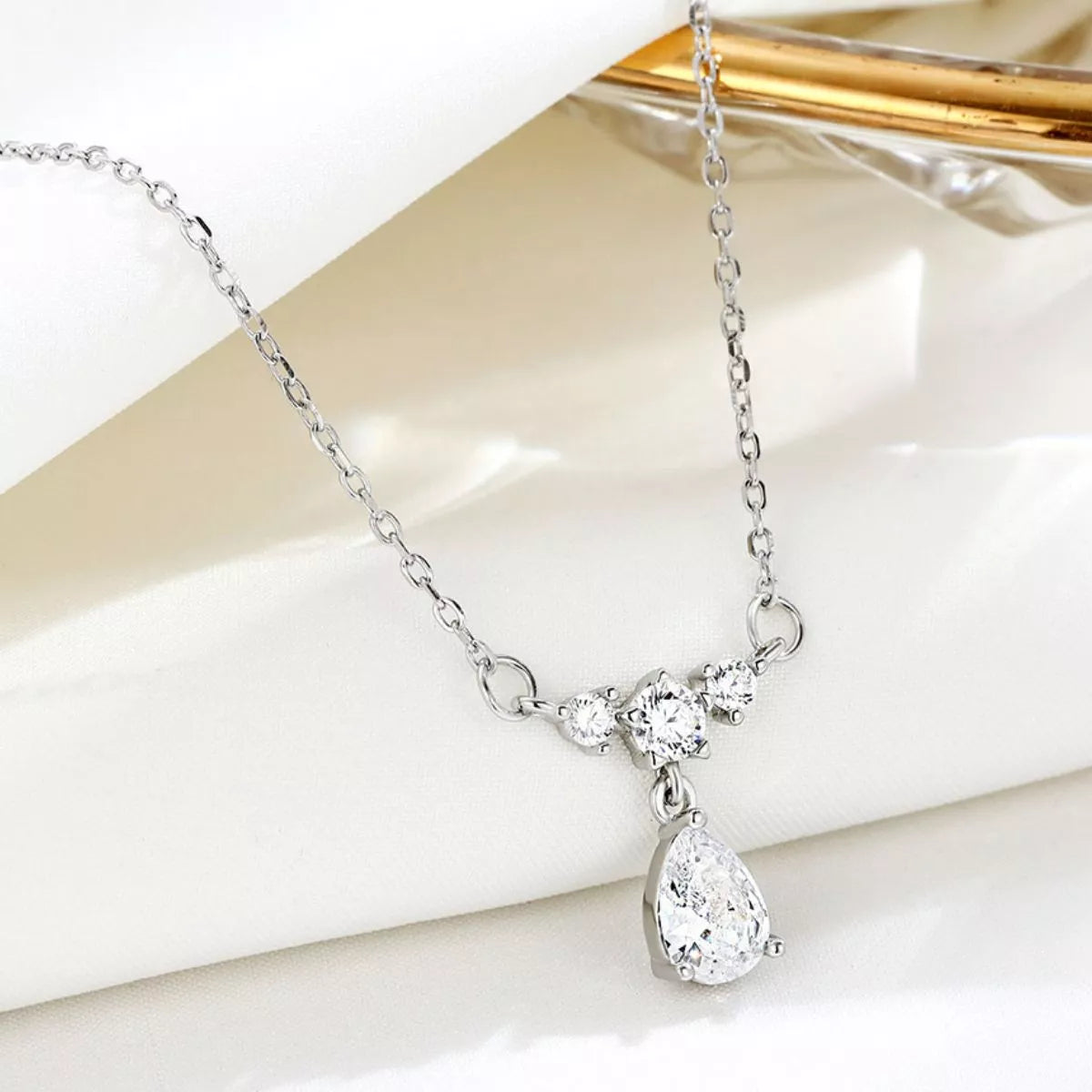 925 sterling silver teardrop zircon necklace with round sparkle accents and dangling teardrop