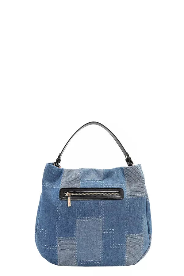 Bosque De Amor denim hobo bag azul claro con cremallera frontal y bolsillos con costuras