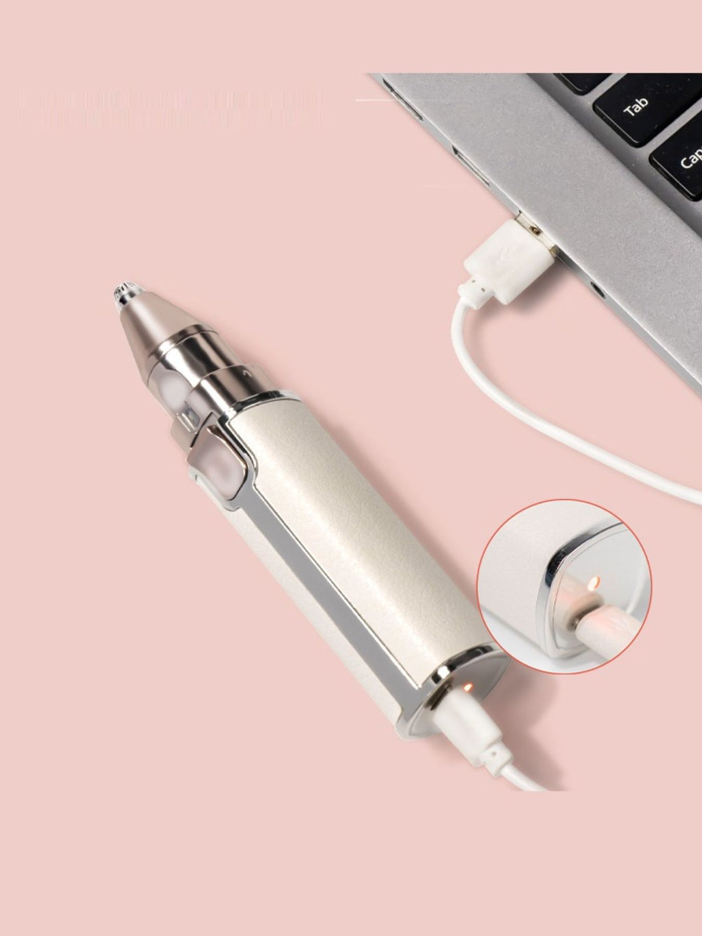 Beige portable eyebrow trimmer with attached trimmer head and charging cable