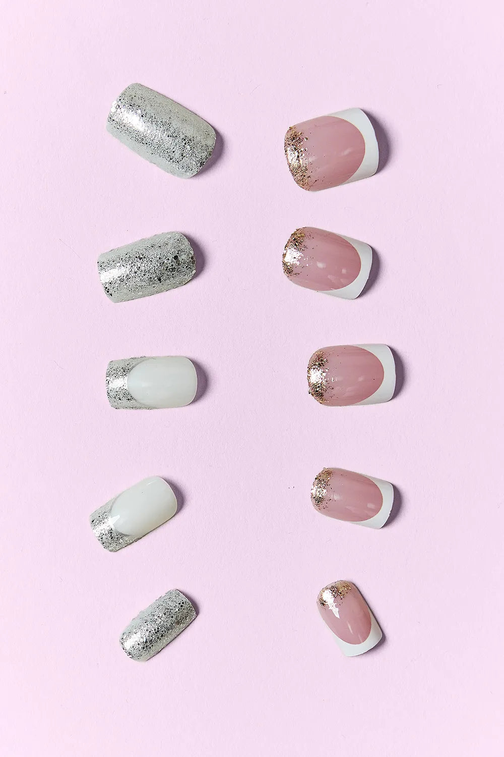 Glamour & Glitz press on nails: silver glitter, white, nude, and gold-speck accents