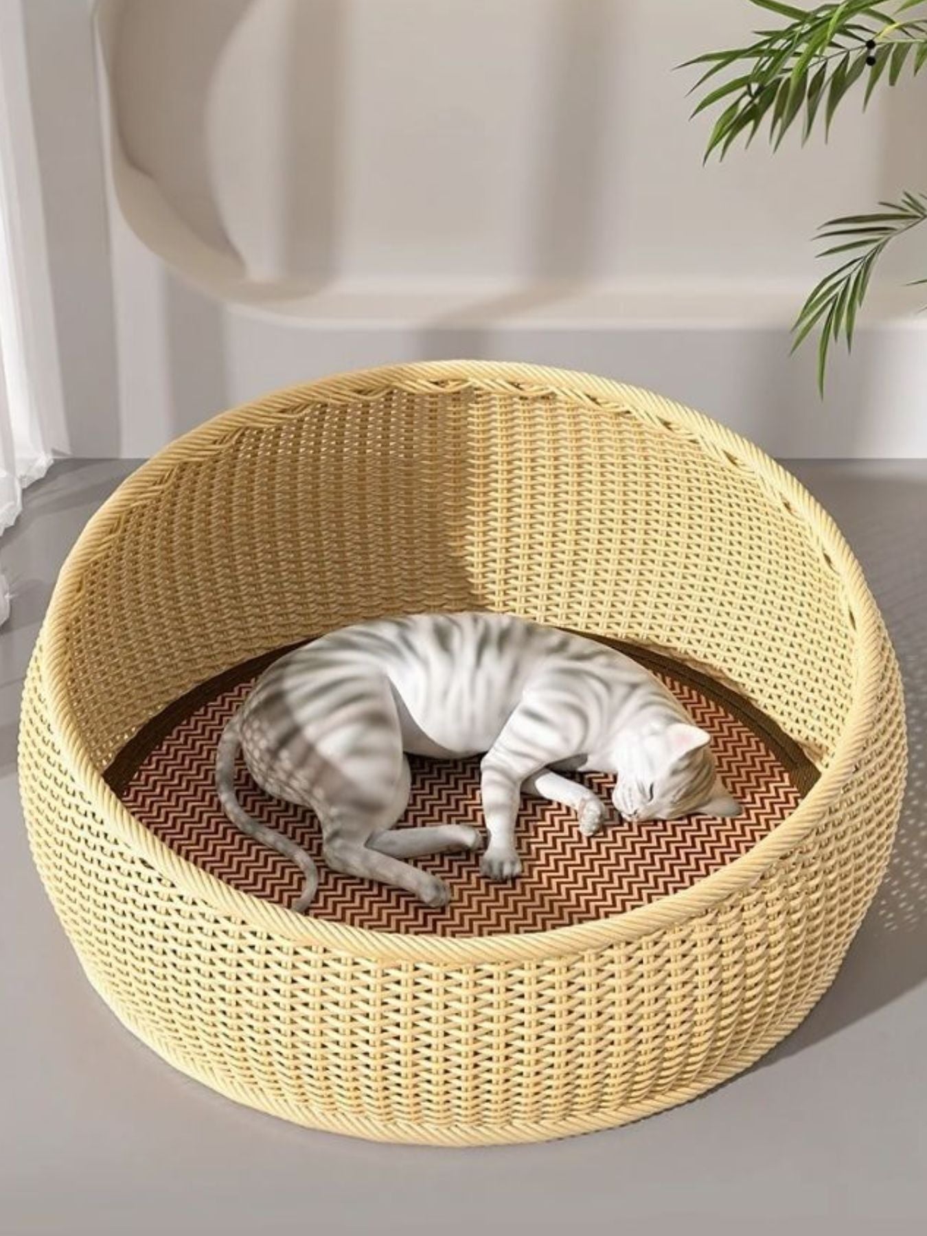 Beige round woven rattan pet nest with patterned cushion, open top