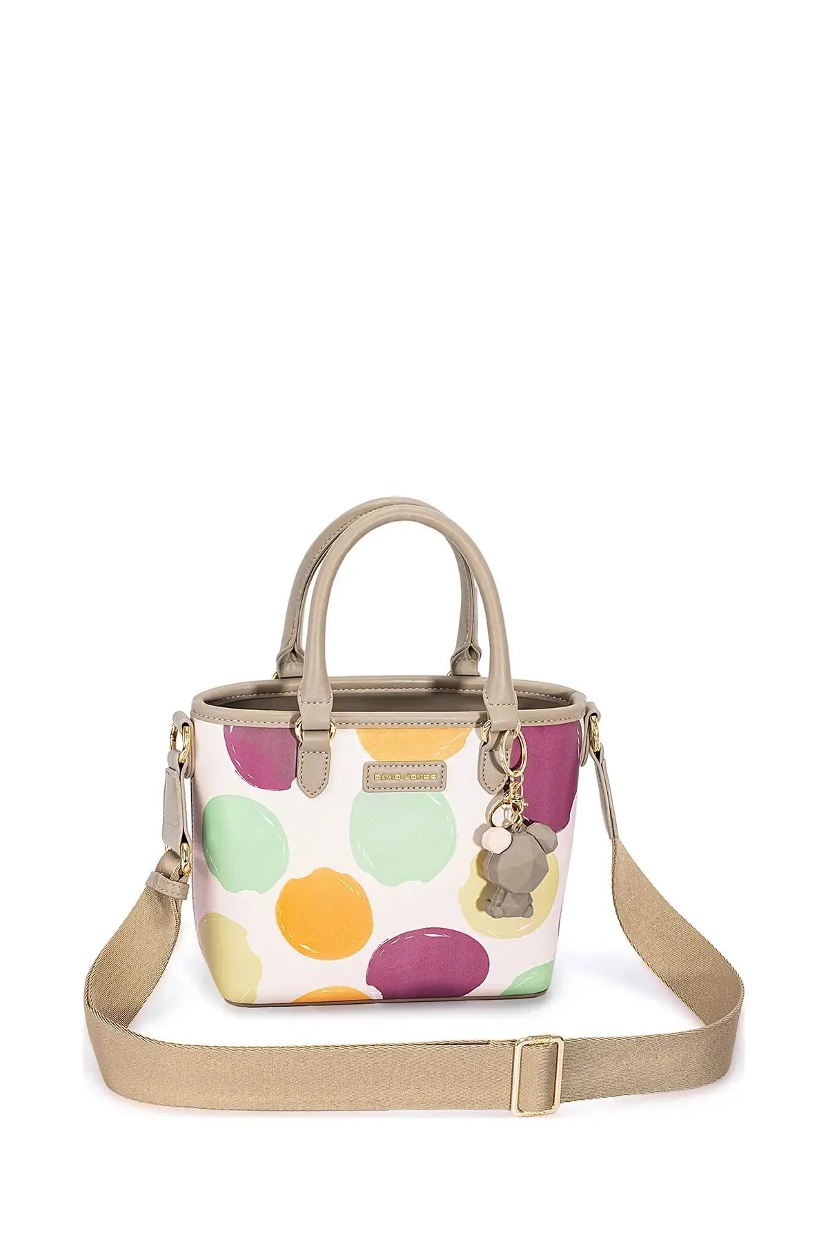 Colorful polka dot handbag with adjustable crossbody strap and gold zipper hardware