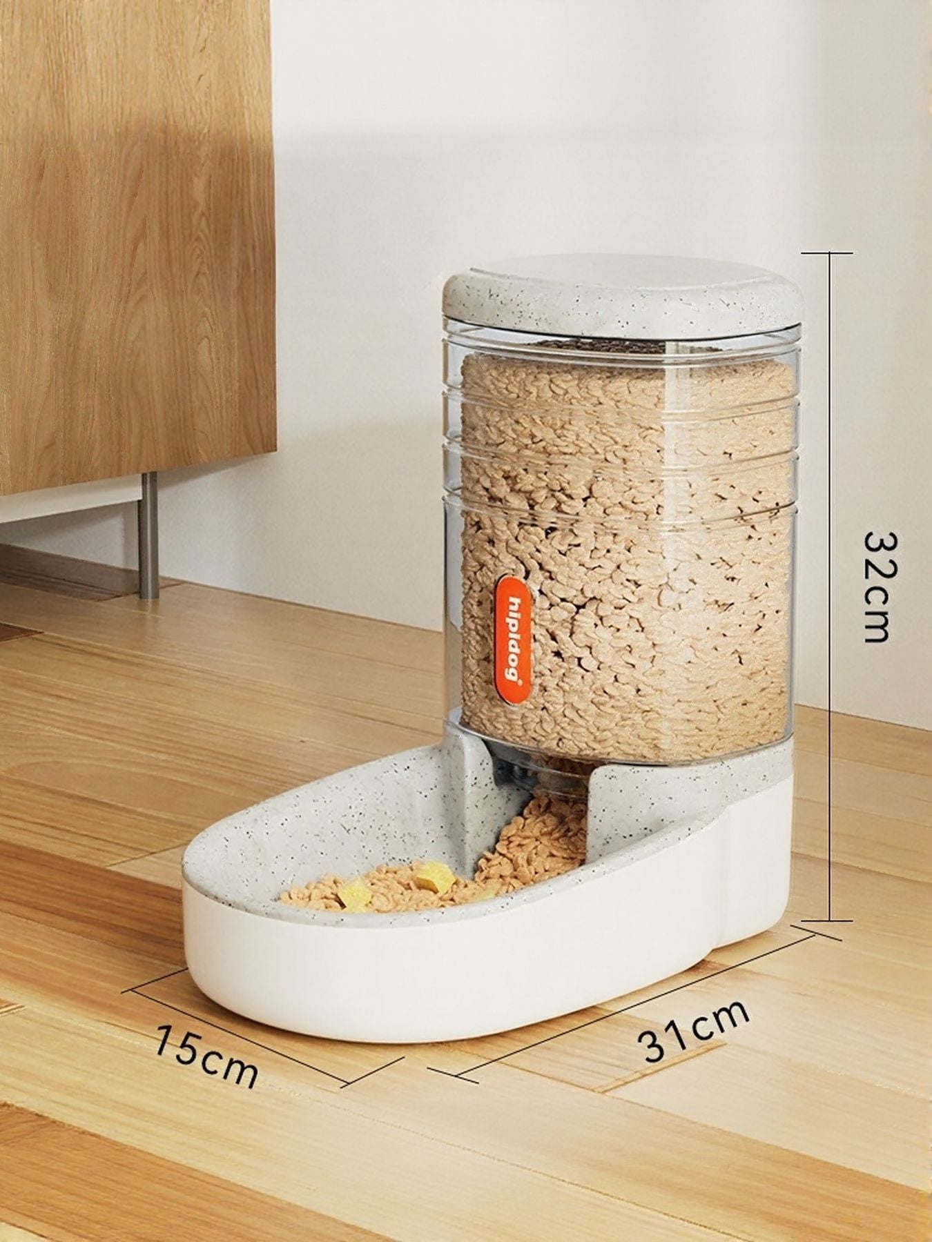 Light gray automatic pet food dispenser with clear container and open feed tray