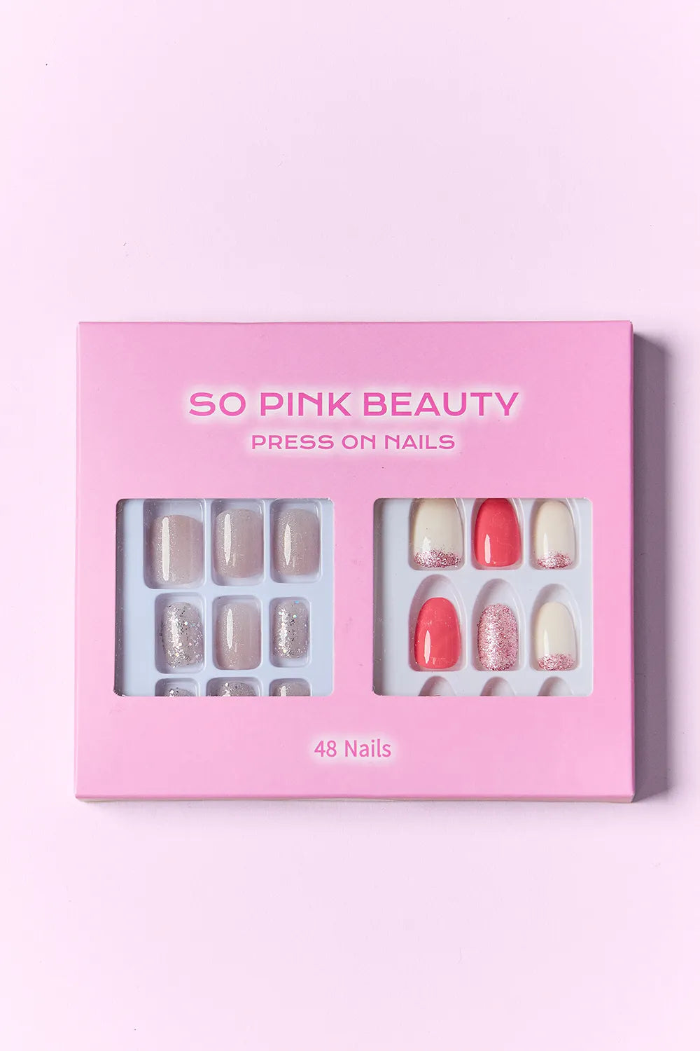 SO PINK BEAUTY press-on nails box showing 48 nails in nude, silver glitter, and red styles