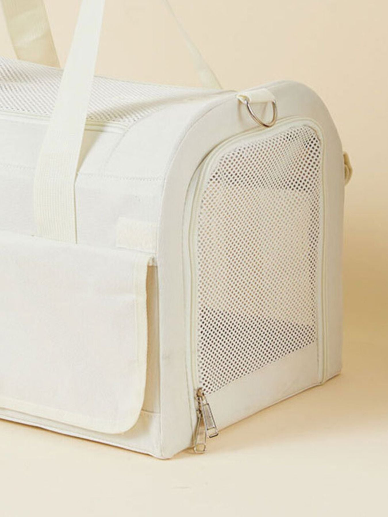Pet carrier bag with arched front mesh door and zipper closure