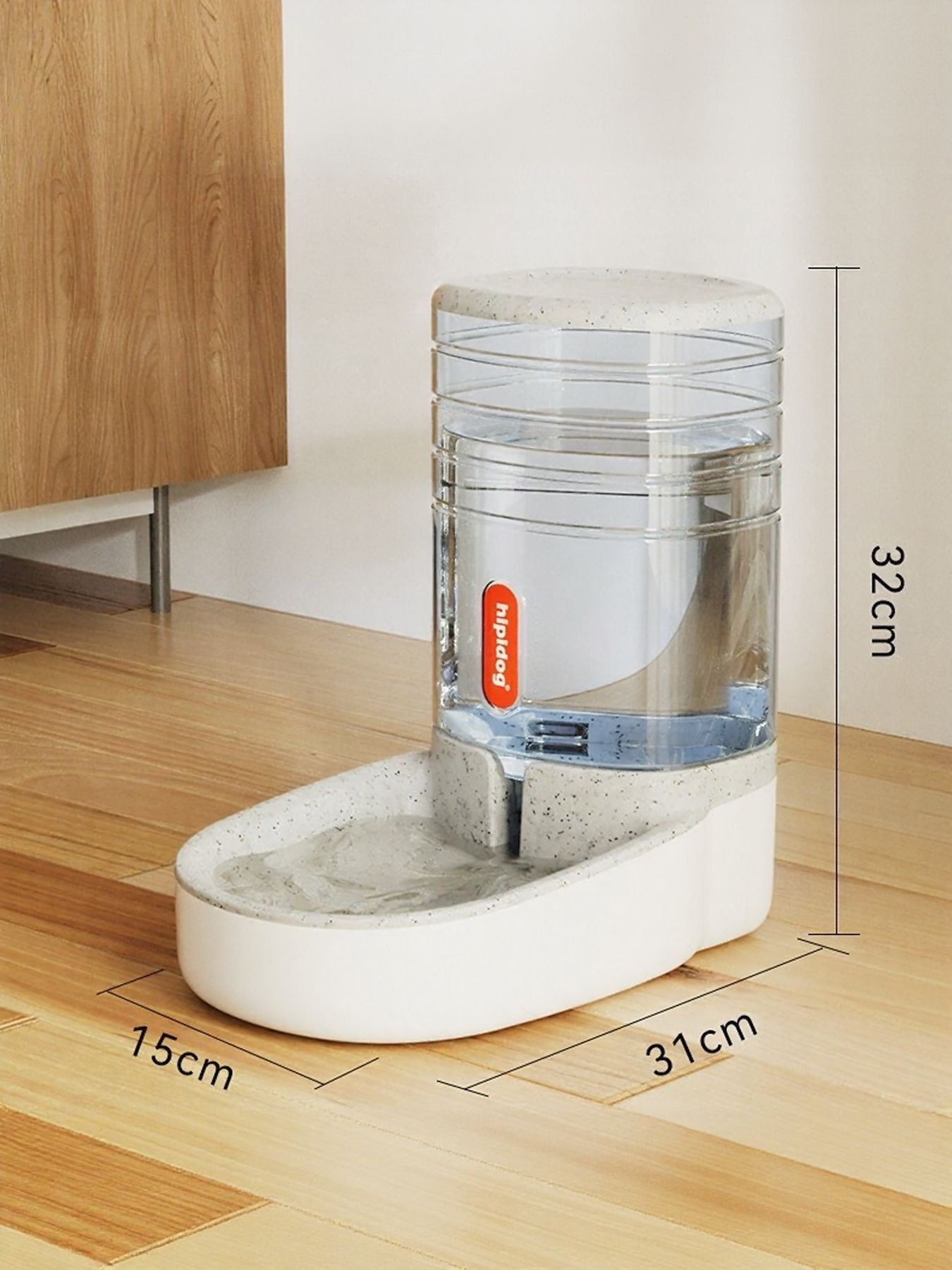 Light gray automatic water dispenser unit with clear tank and white base