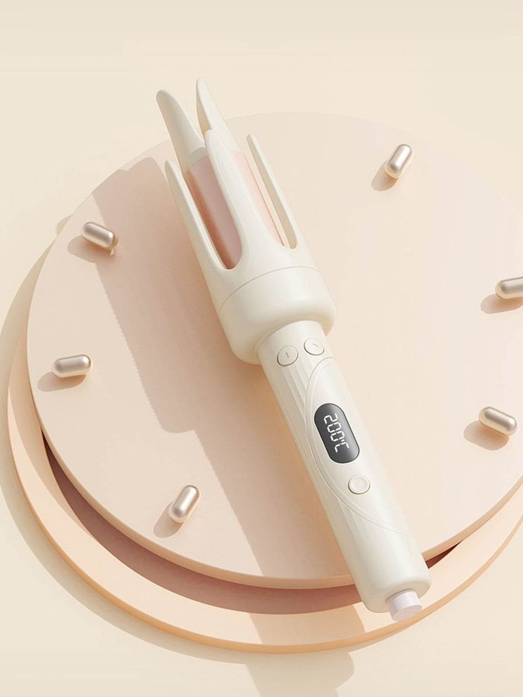 Beige automatic hair curling iron top angle with three barrels and heat level display