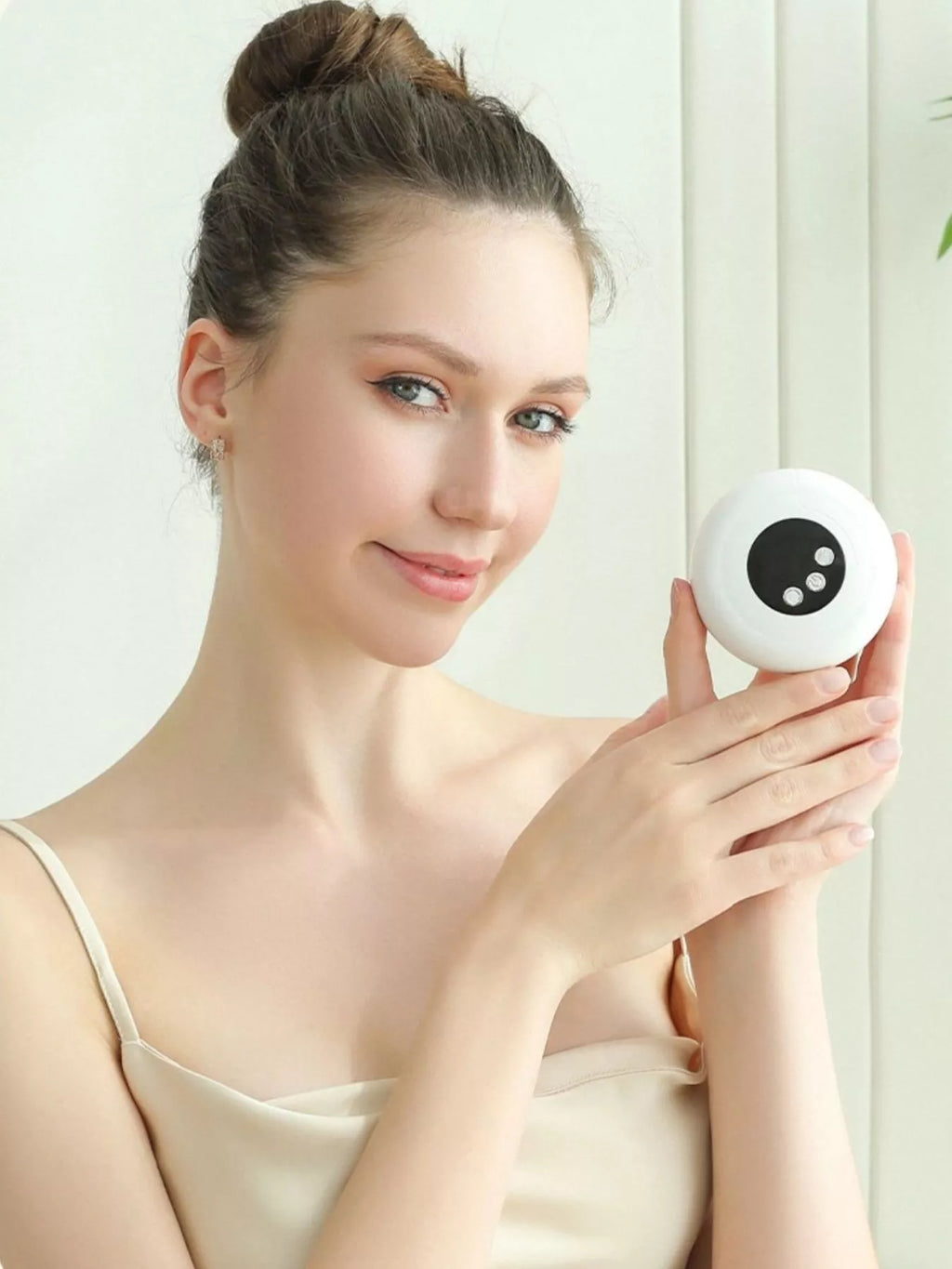 Portable electric nail buffer polisher, white round handheld device with black control panel
