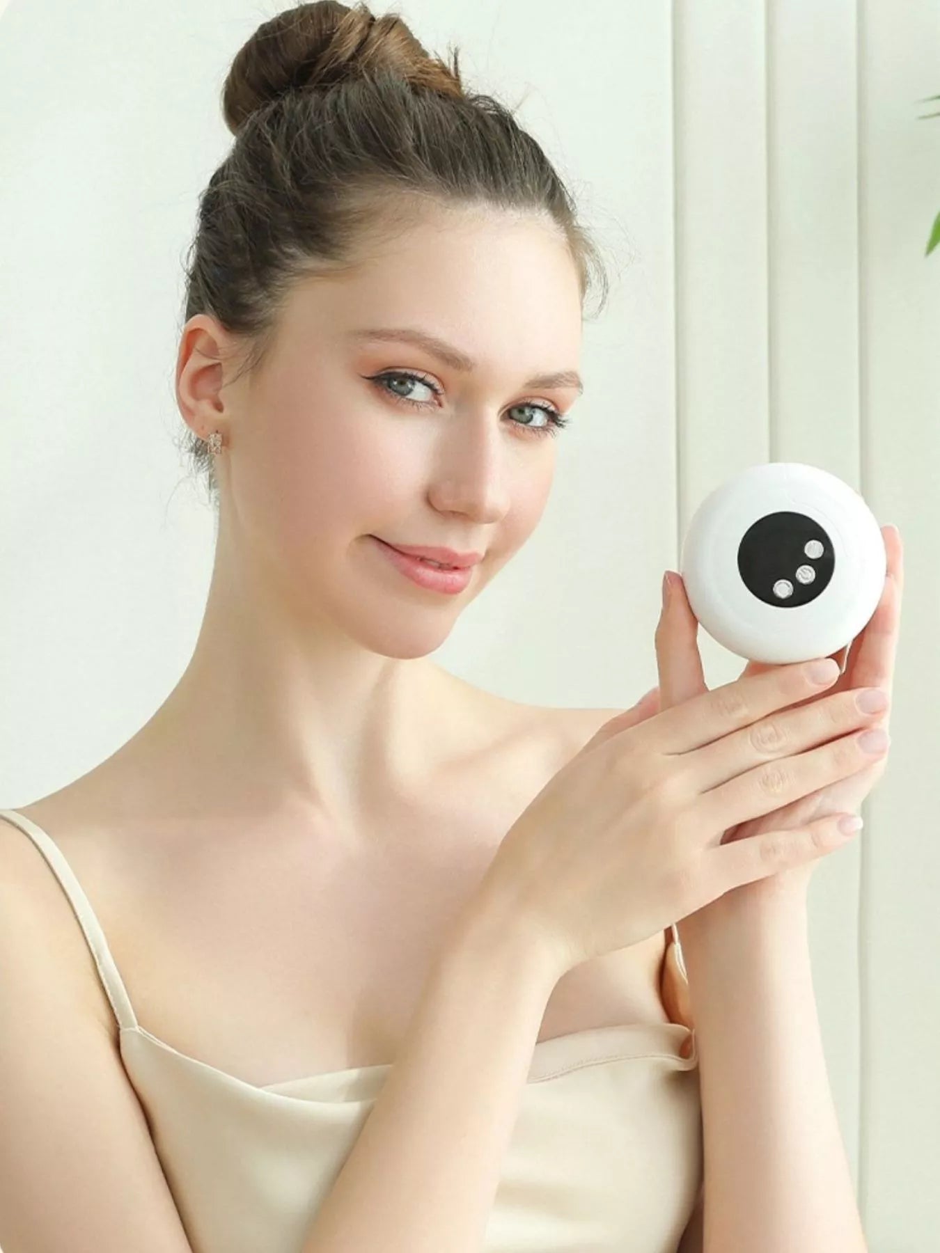 Portable electric nail buffer polisher, white round handheld device with black control panel