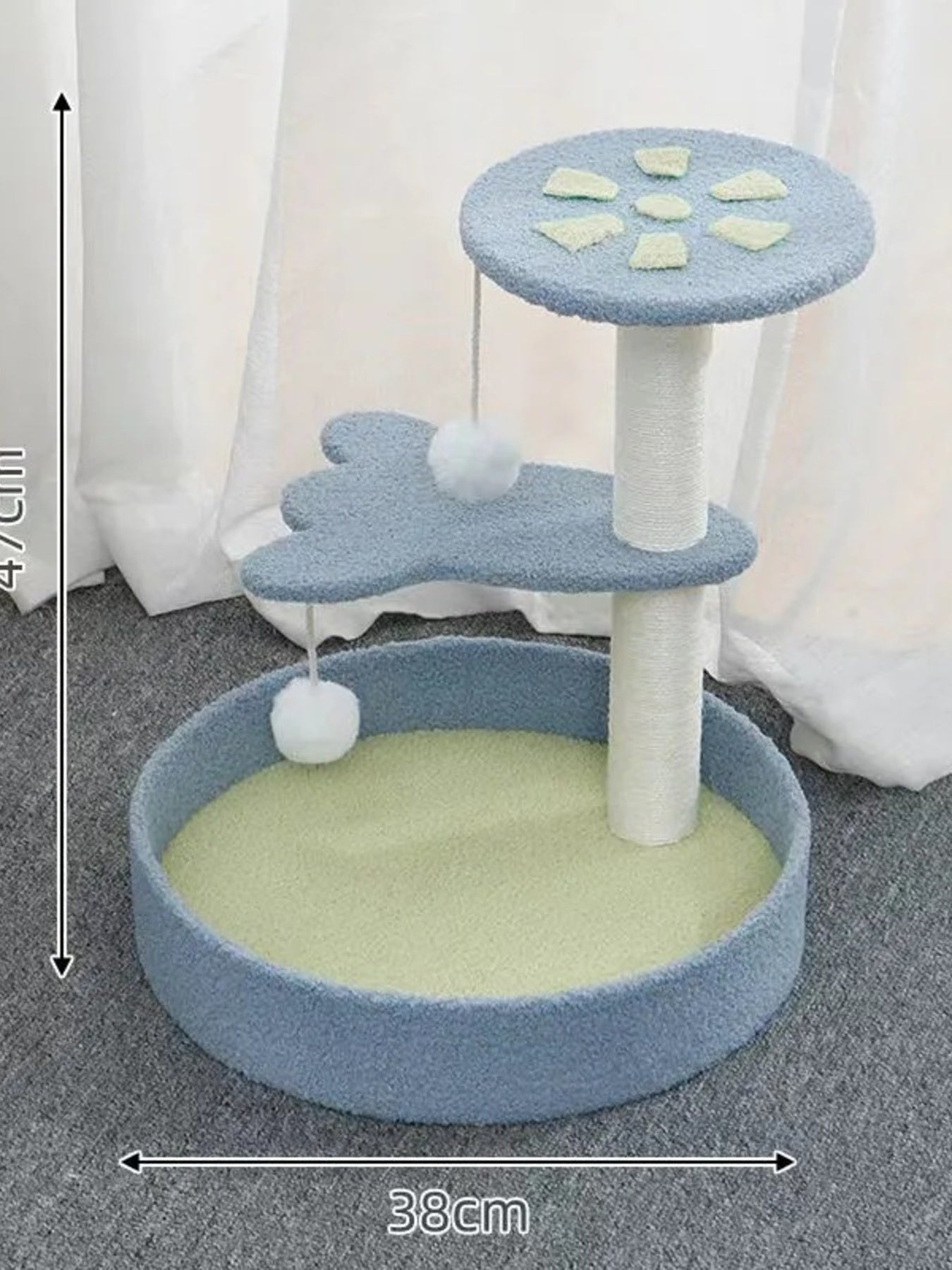 Blue cat scratching post with two round platforms and dangling ball toy