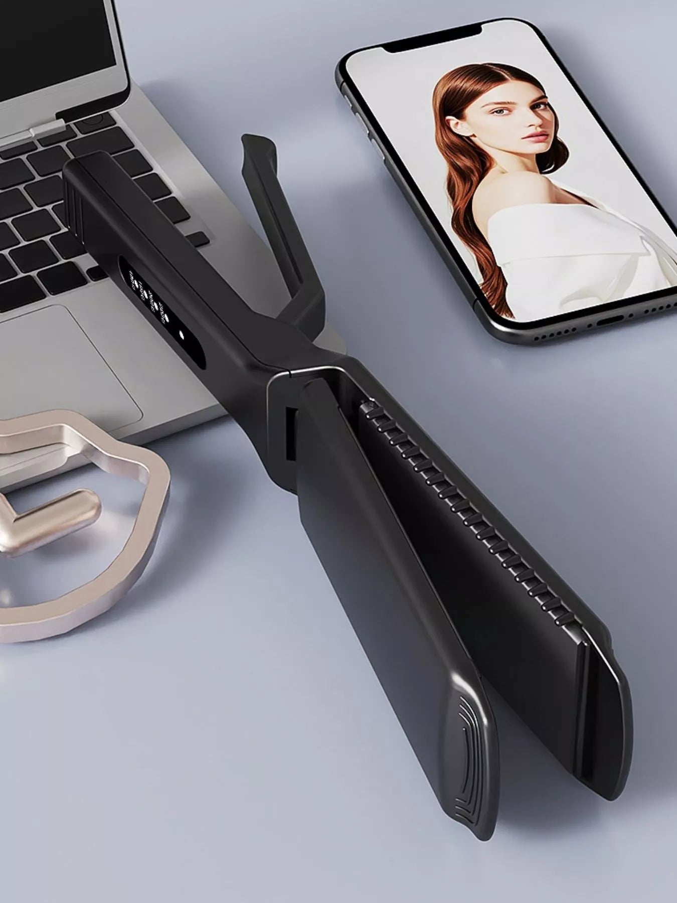 Black adjustable temperature hair straightener with vented plates