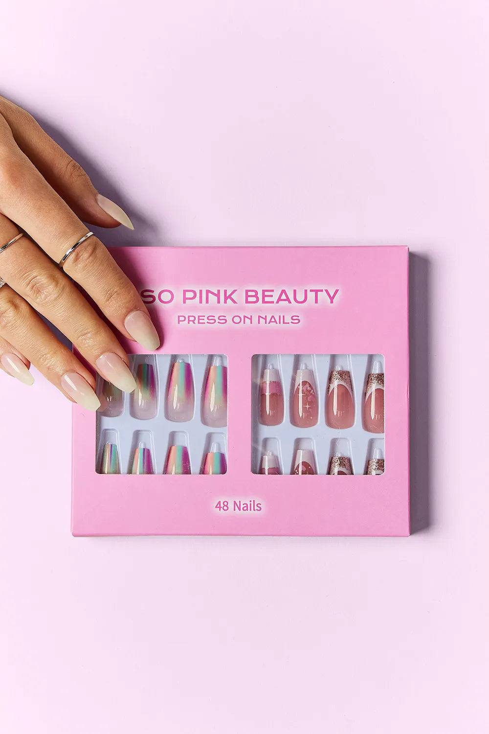 Press-on nails box with 48 nails, long nude tips with holographic accents