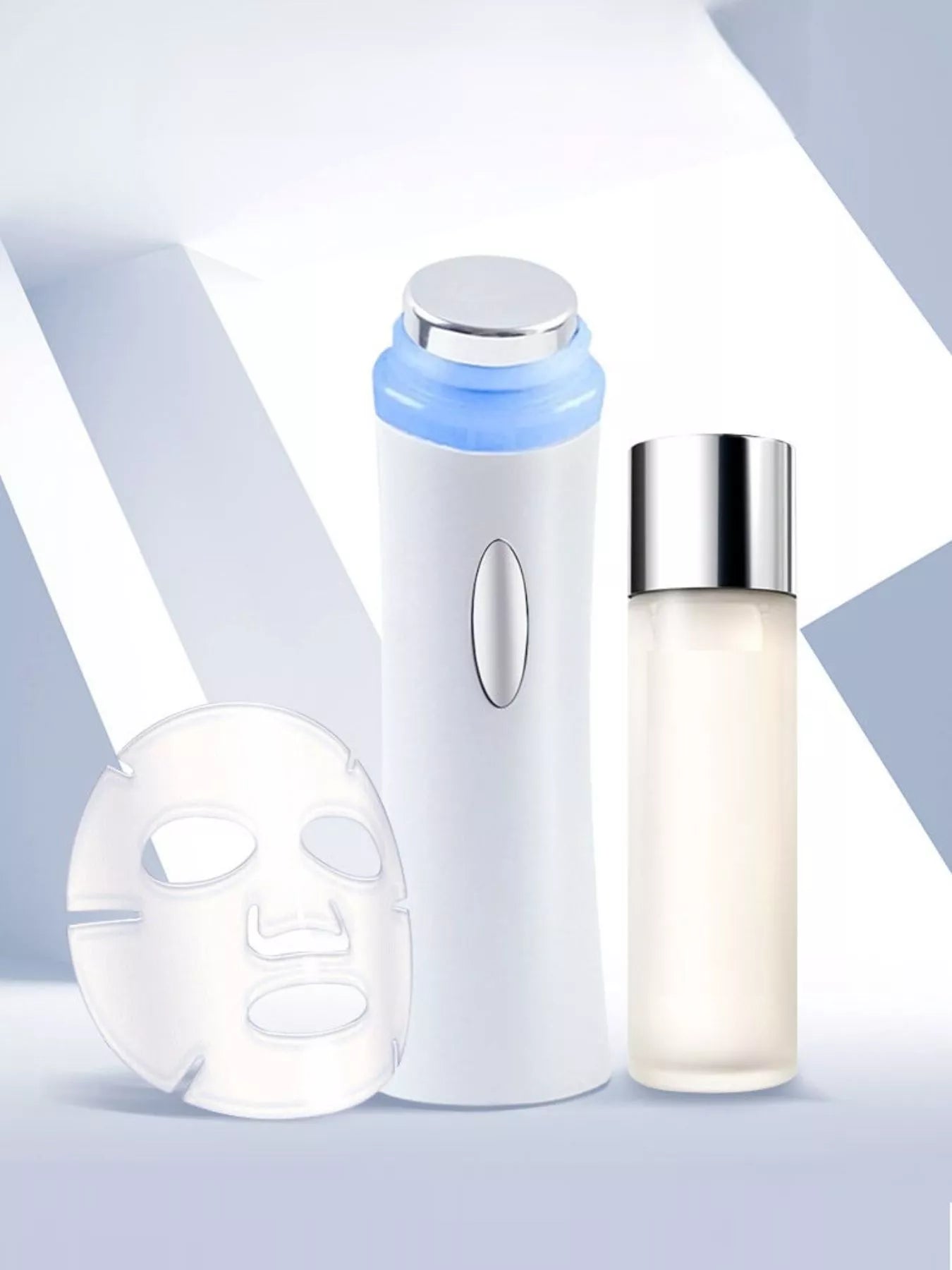 White facial skin tightening beauty device with chrome top and oval button