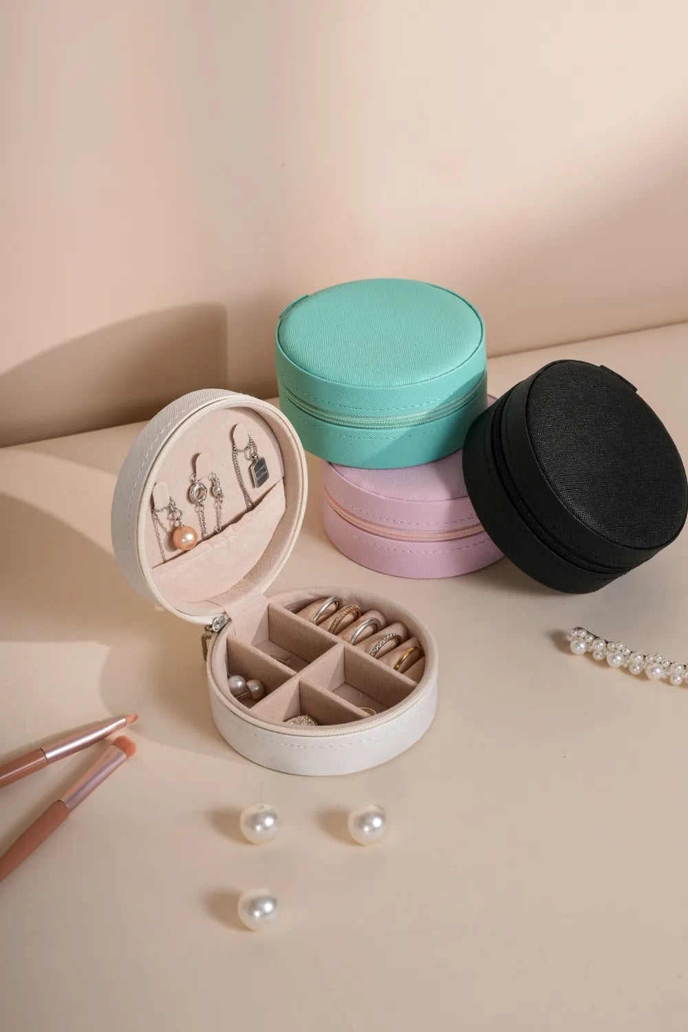 Teal PU leather jewelry box with round lid and ring/earring compartments