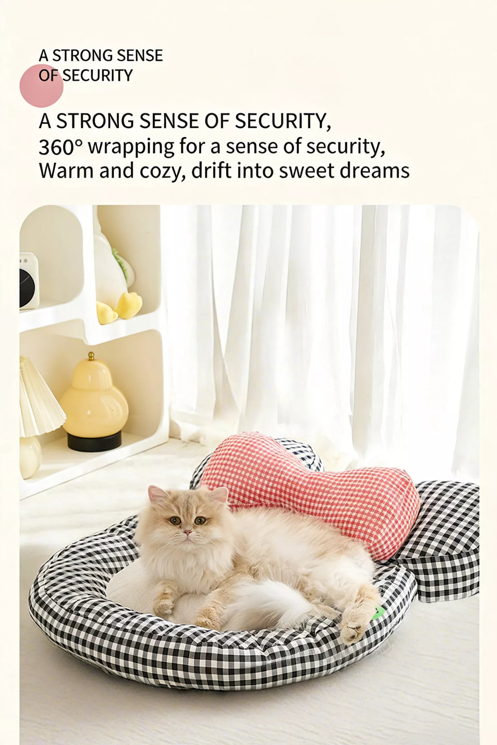 Plaid pet bed with checkered bow bolster, cat resting in oval cushion