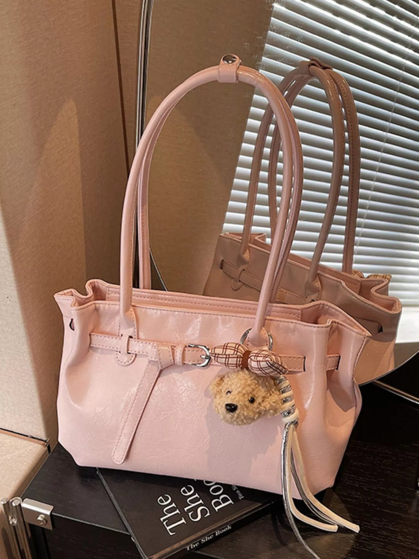 Blush pink leather shoulder bag, dog charm keyring and plaid bow on front strap