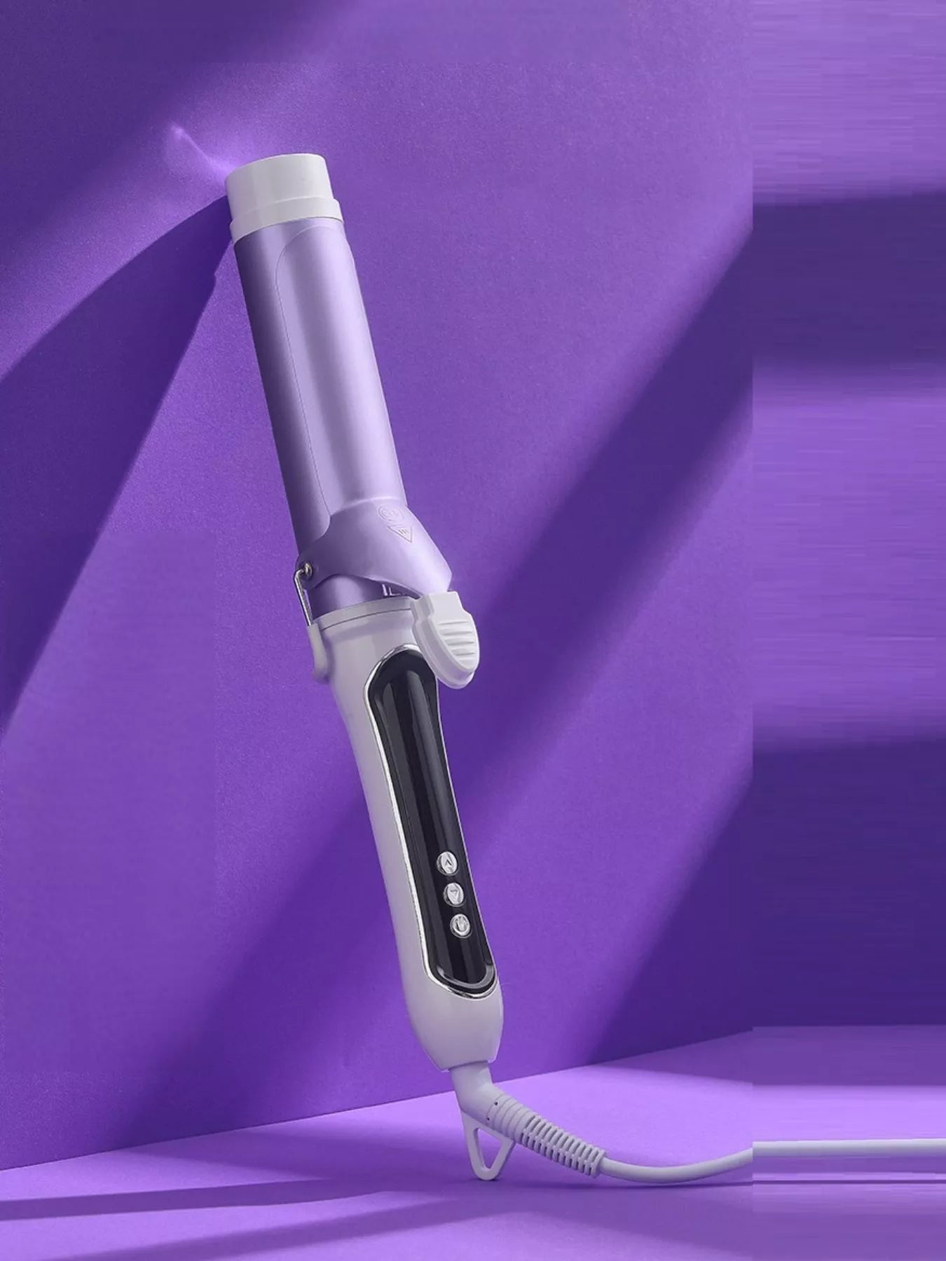 Purple automatic rotating ceramic curling iron, side view with control buttons.