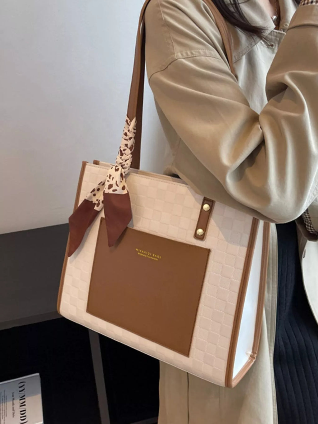 White and brown color block tote shoulder bag with scarf tie at top handles