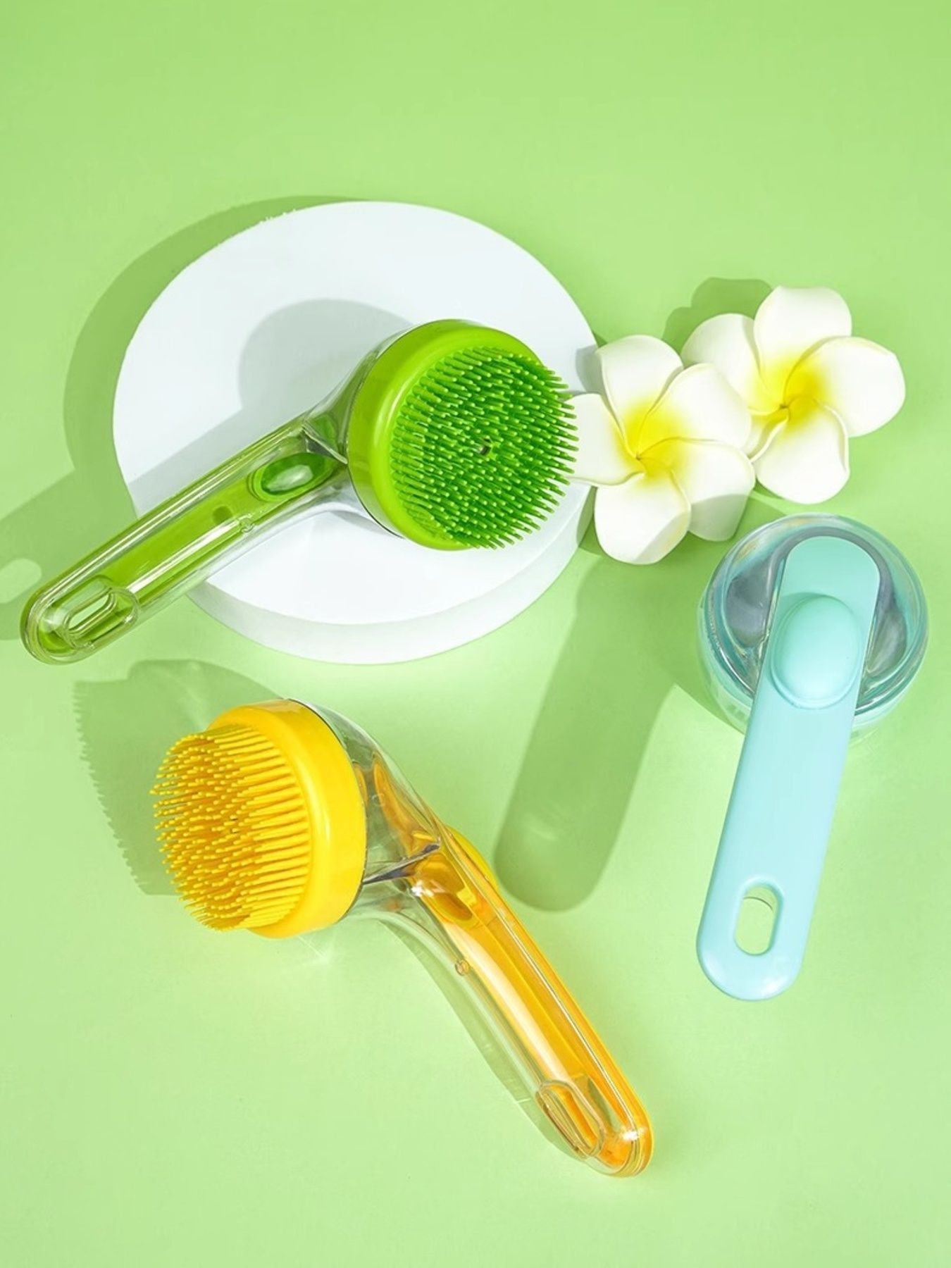 Soft Pet Shower Brush with green and yellow heads, plus light blue handle for bathing