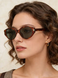 Lightweight cat-eye sunglasses in tortoiseshell with dark lenses and metal logo