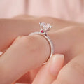 925 sterling silver moissanite ring with triangular top and red accent