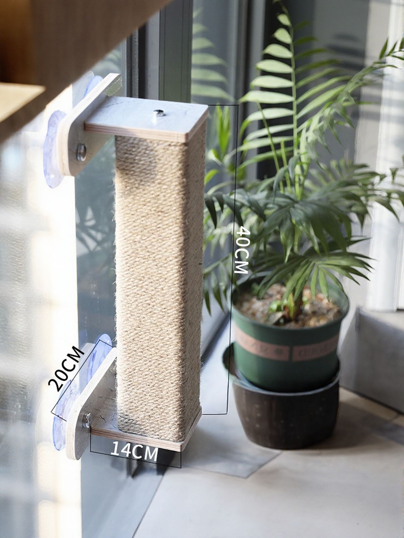 Window-mounted sisal scratching post with wood top, showing height and width measurements