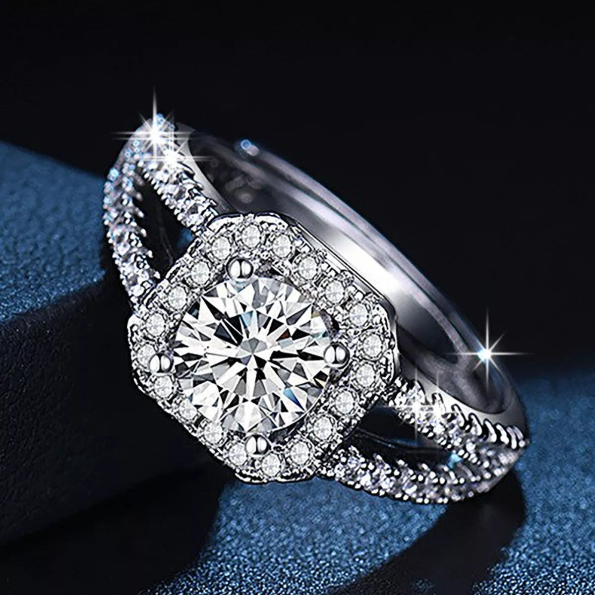 925 sterling silver moissanite ring, angled side view with pavé band and round center stone