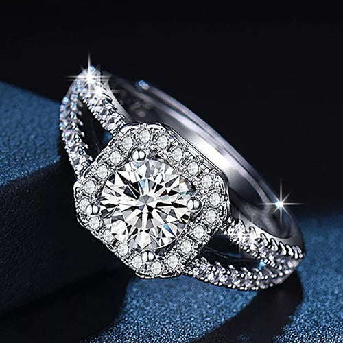 925 sterling silver moissanite ring, angled side view with pavé band and round center stone