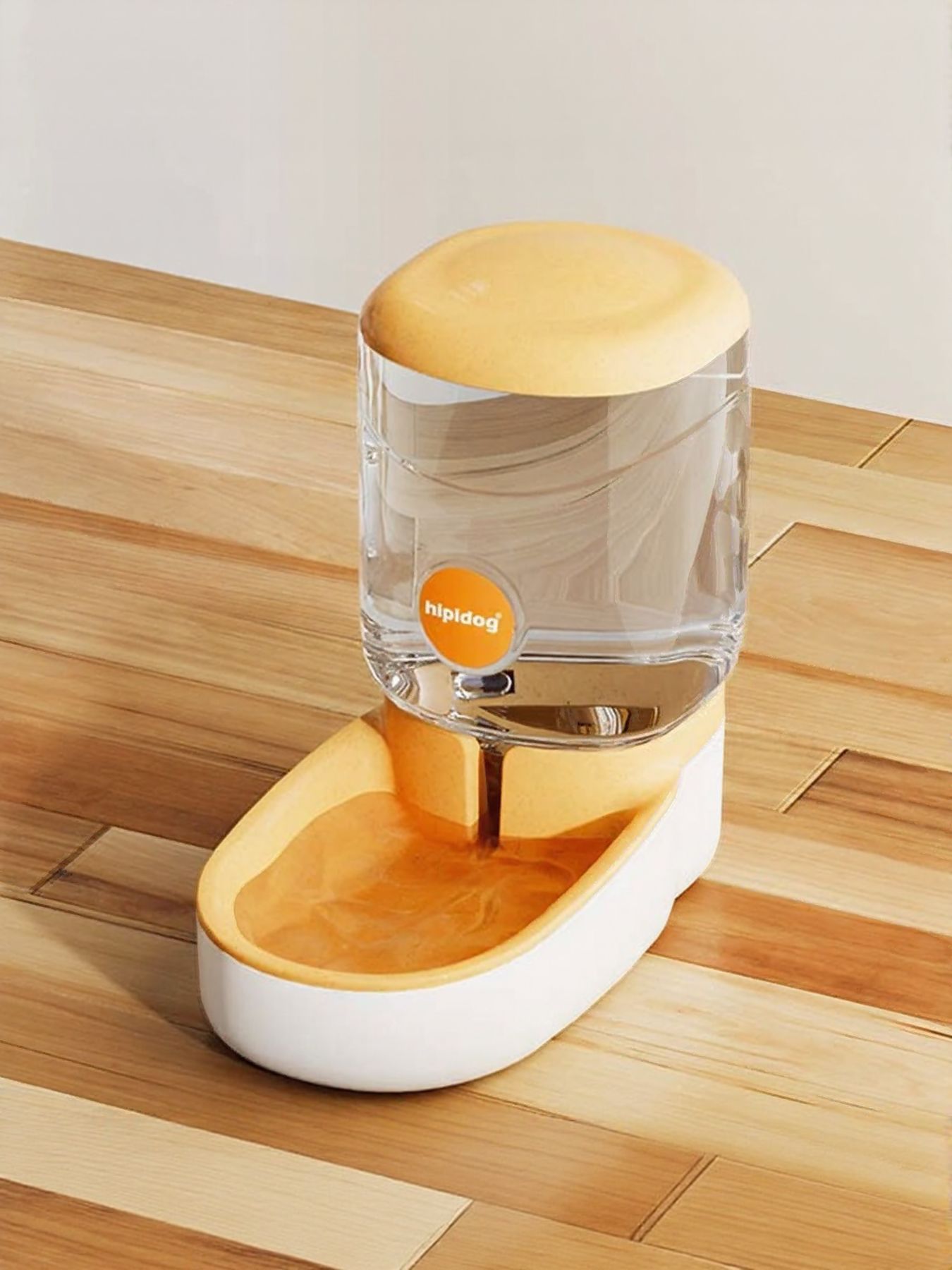 Pastel yellow automatic water dispenser with clear tank and white double reservoir