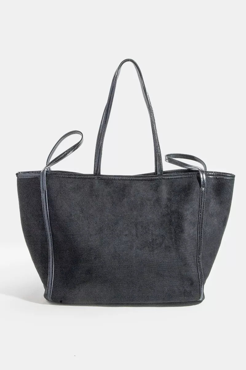 Black suede tote bag with faux-leather trim and two top handles, front view.
