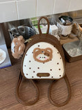 Cartoon Bear Backpack Bag in brown with white front panel, bear patch and dotted print