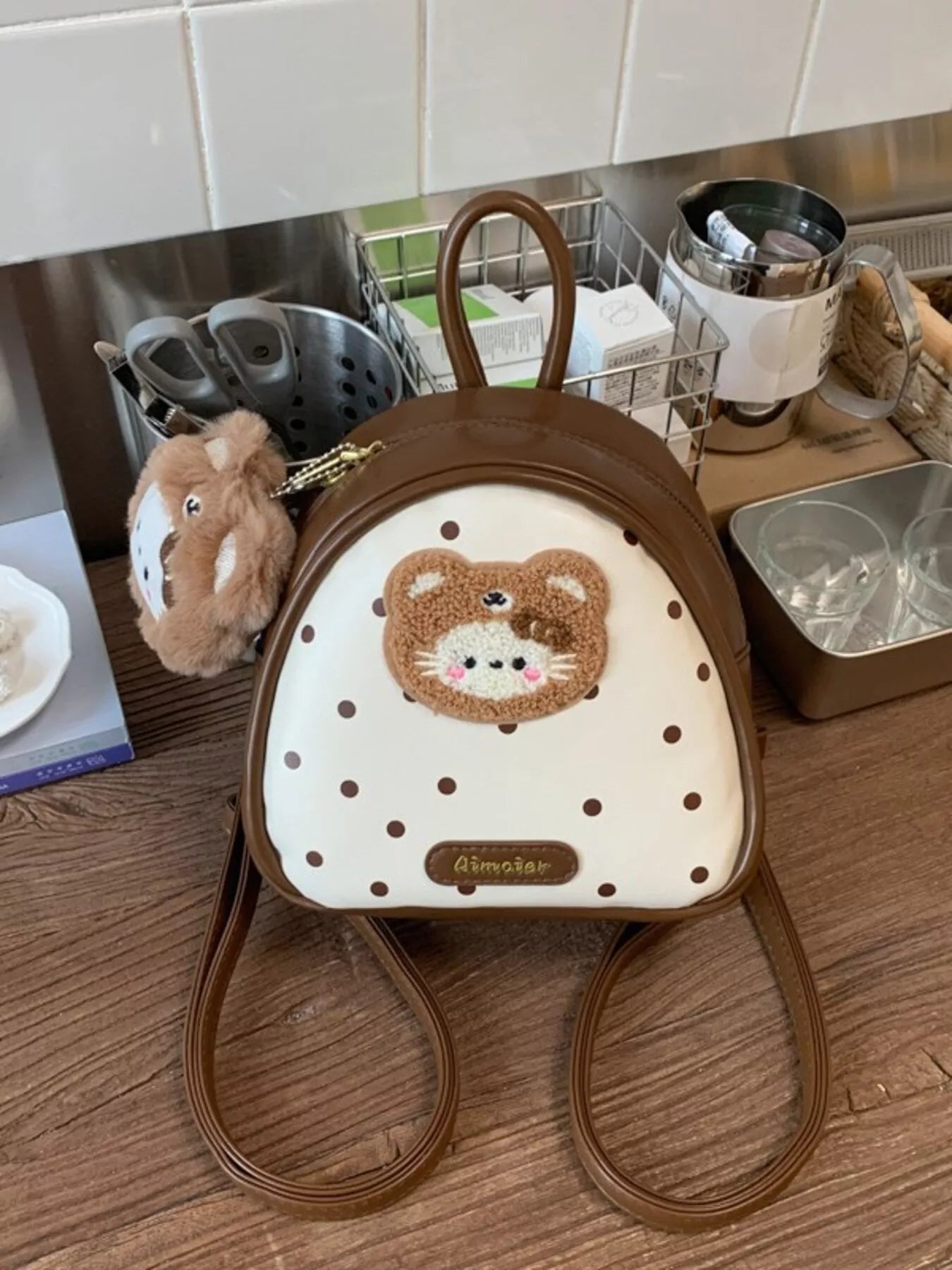 Cartoon Bear Backpack Bag in brown with white front panel, bear patch and dotted print